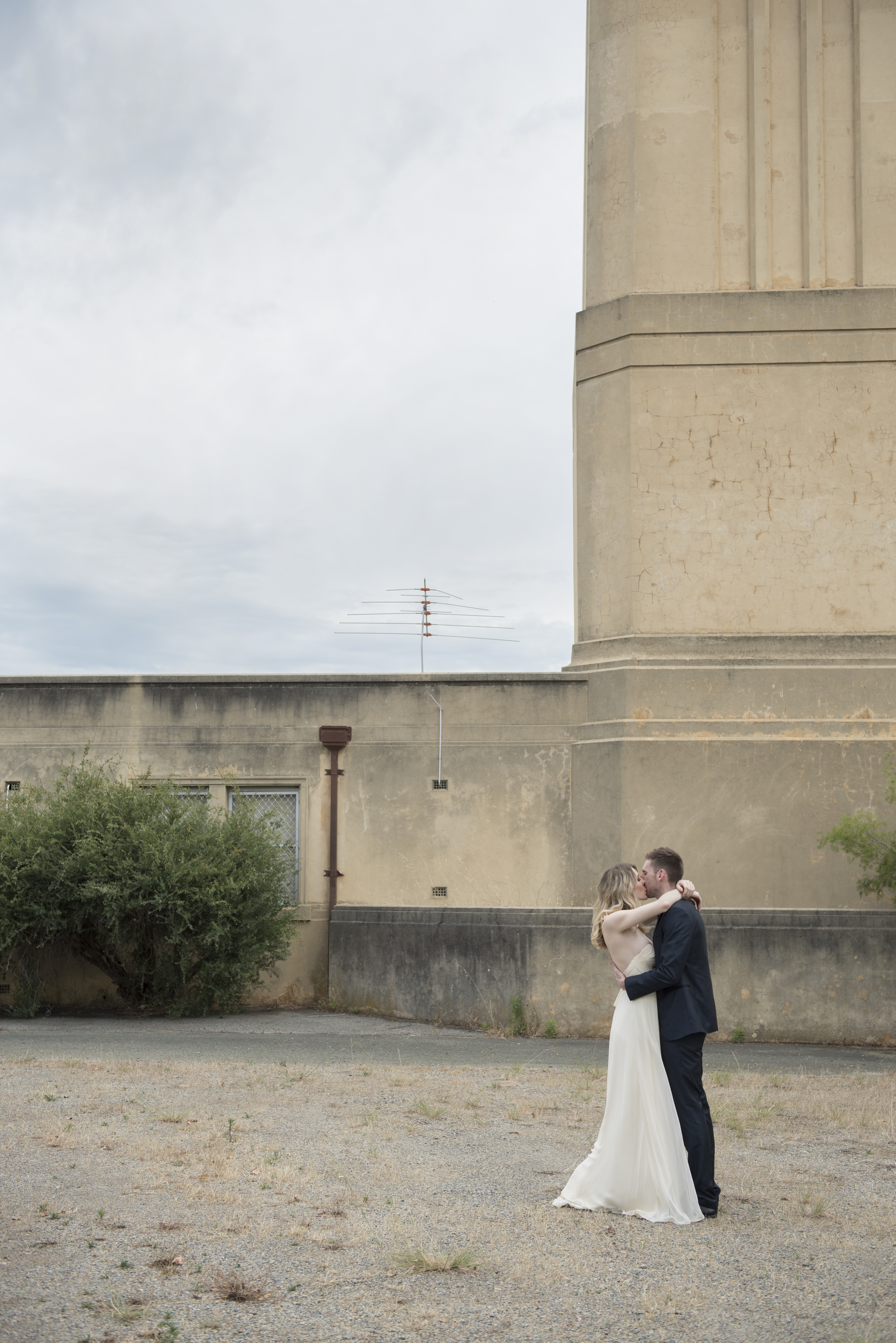 Bride and groom near power station