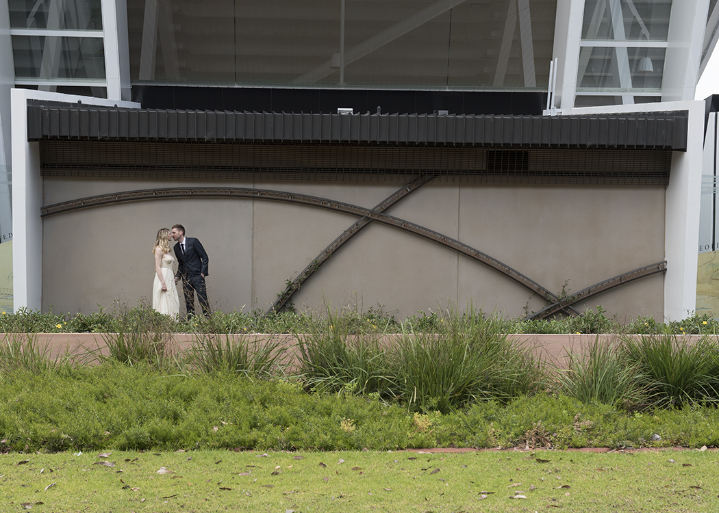 Bride and groom in Perth stadium