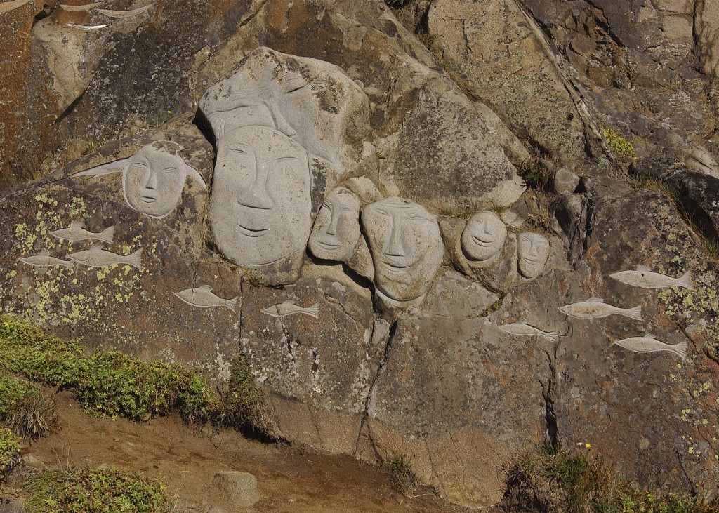 Rock carvings of faces and fish in Qaqortoq, Greenland