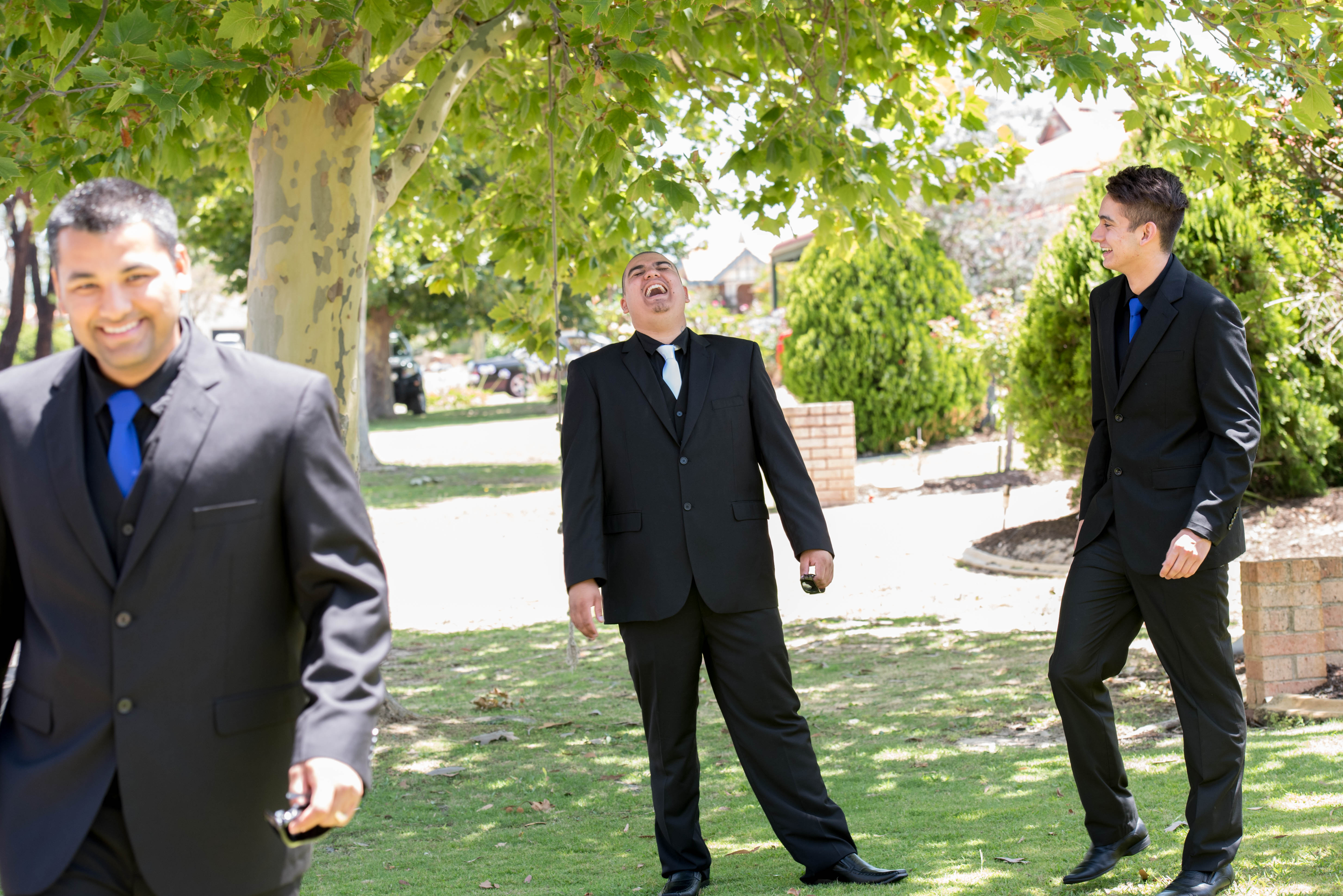 Groom getting ready on wedding day. Funny moment with groomsmen