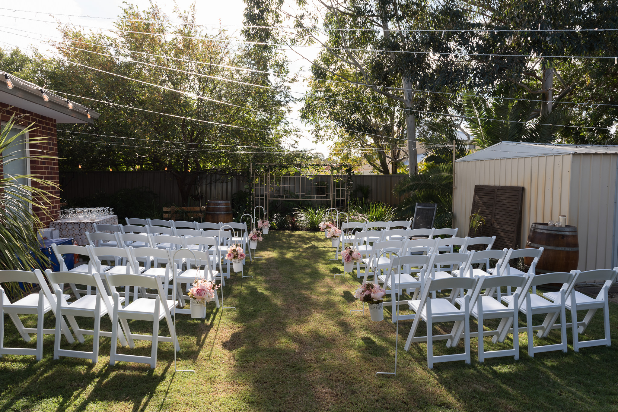 Backyard wedding ceremony setup in Manning