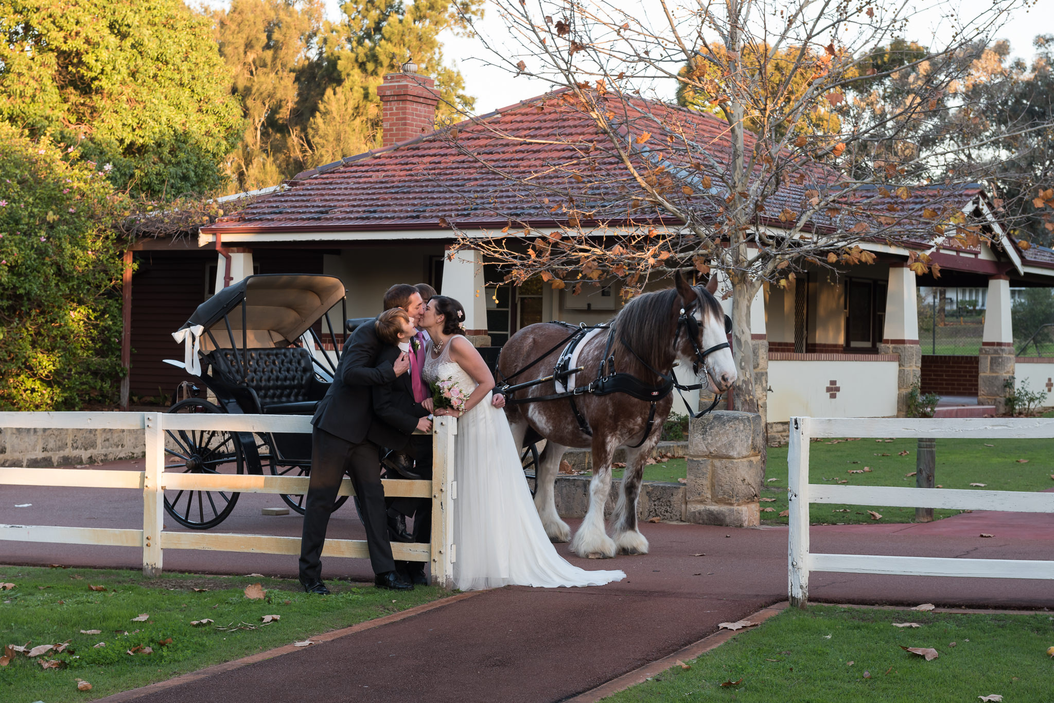 Bride and groom kiss