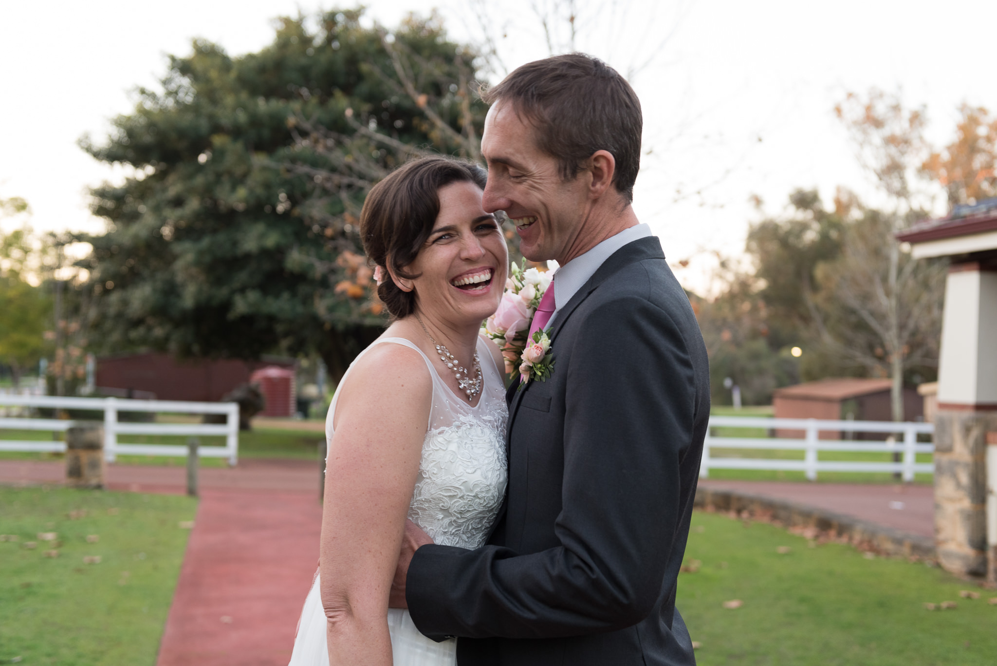 Bride and groom laughing