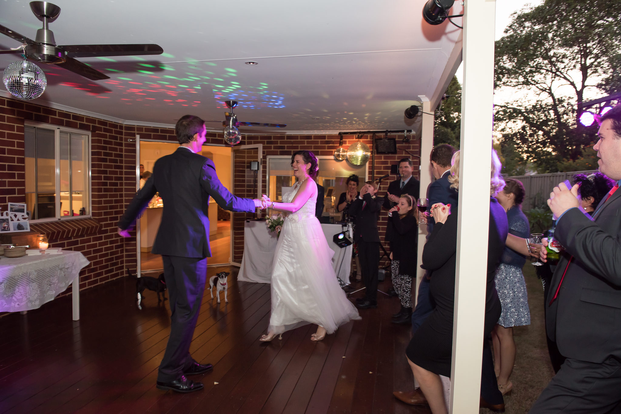 Bride and groom dancing on dancefloor