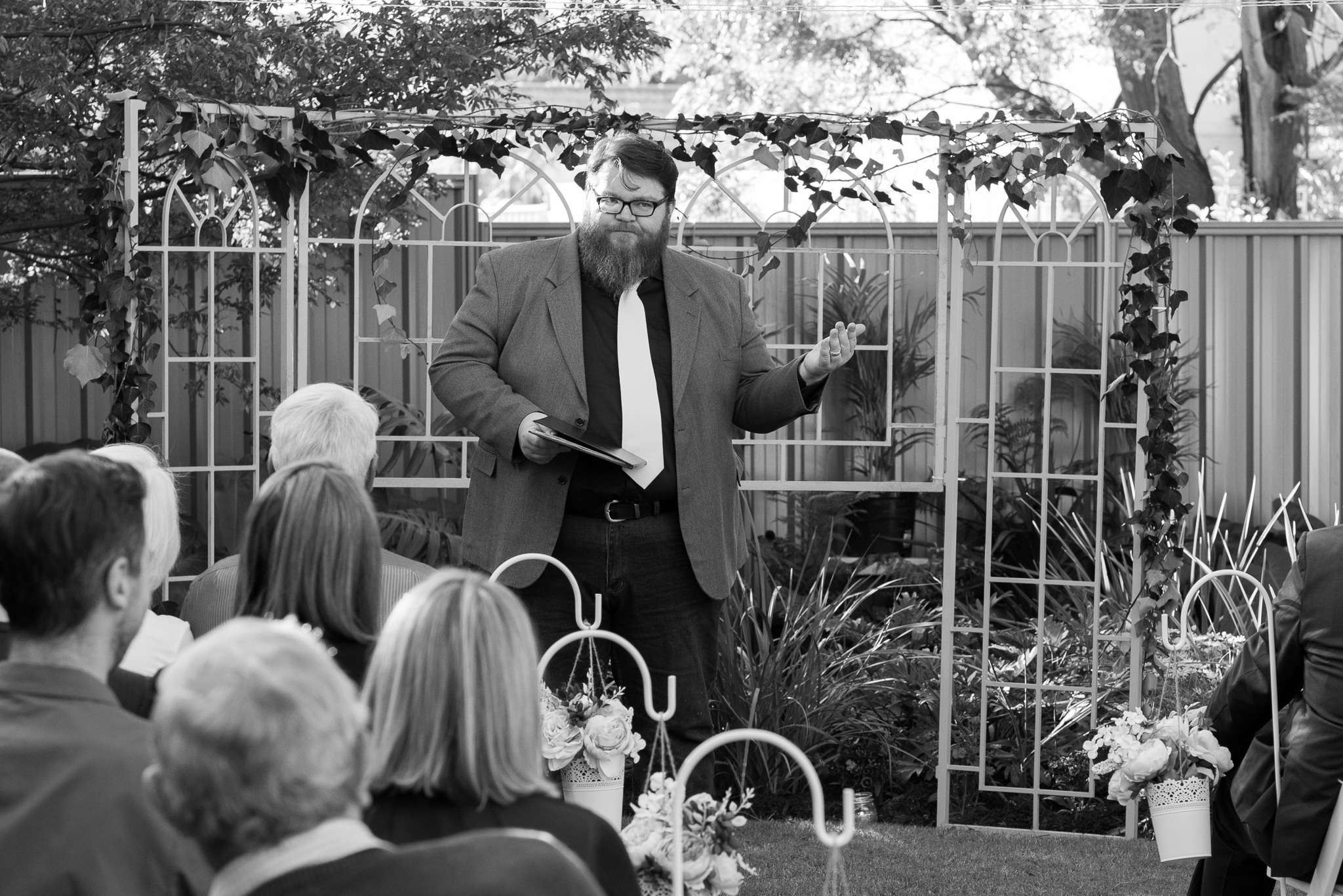 celebrant encourages the wedding guests during ceremony