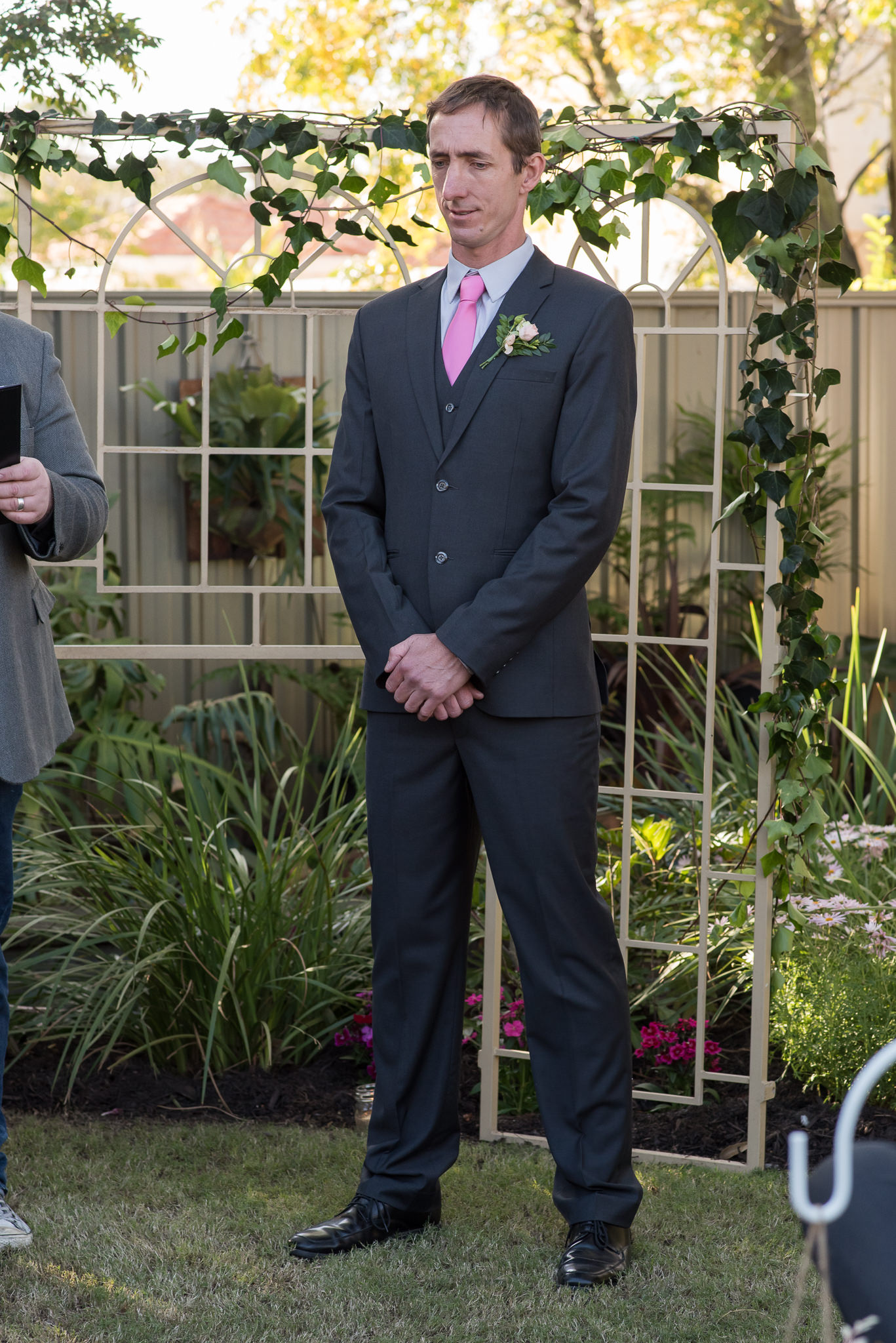 groom looking serious during his ceremony