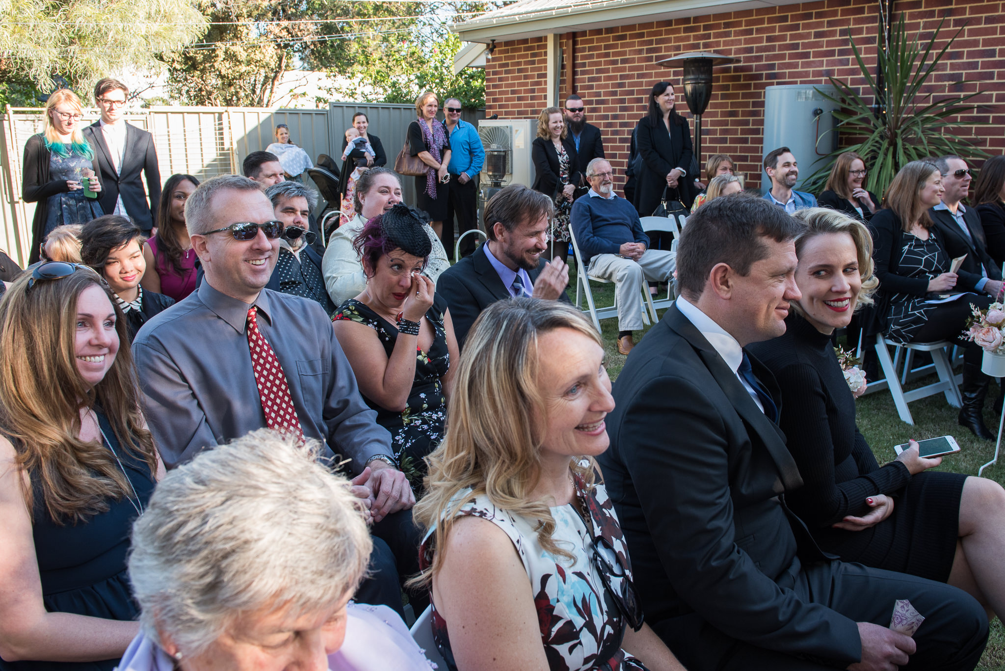 wedding guests in backyard wedding