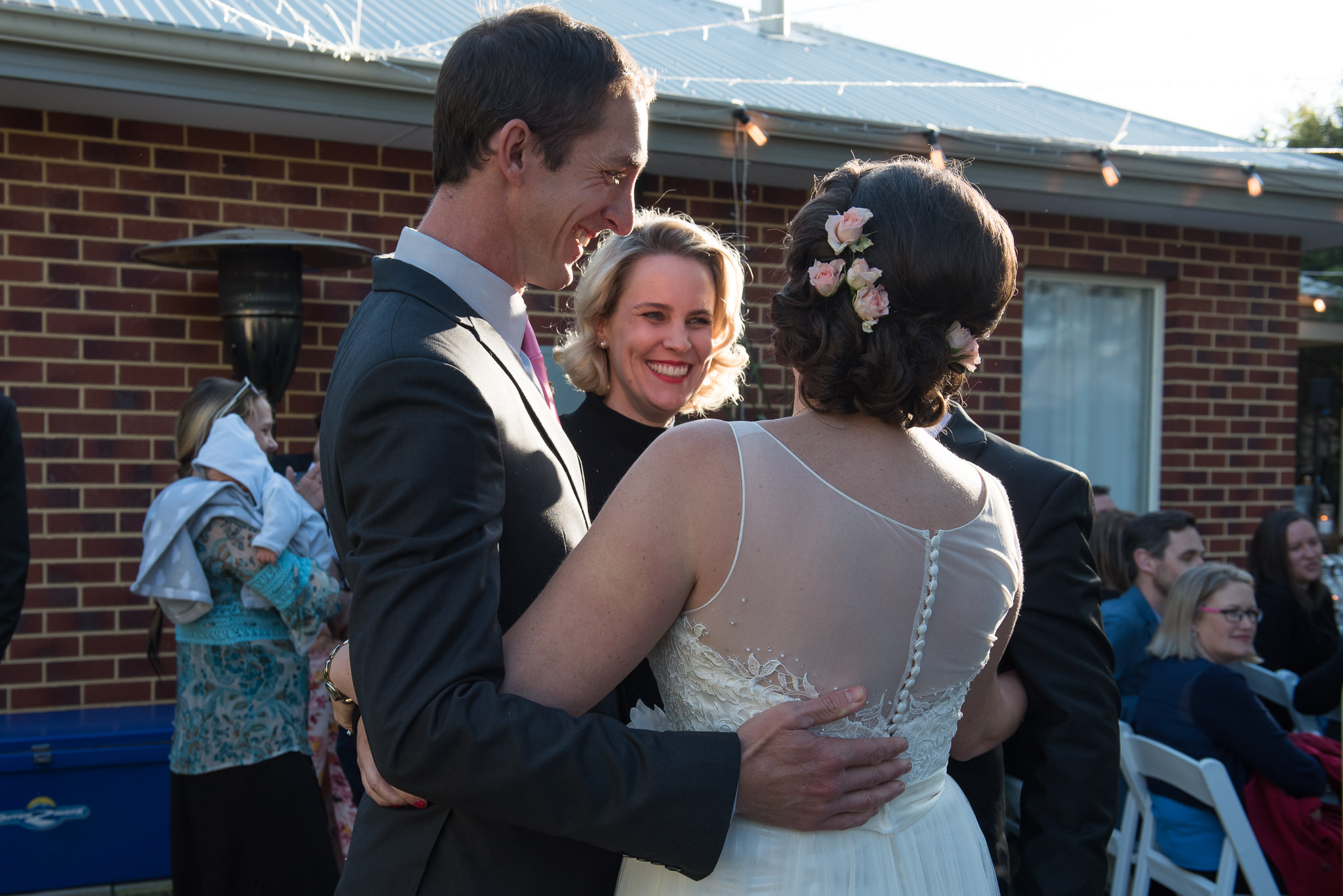 congratulating the bride and groom