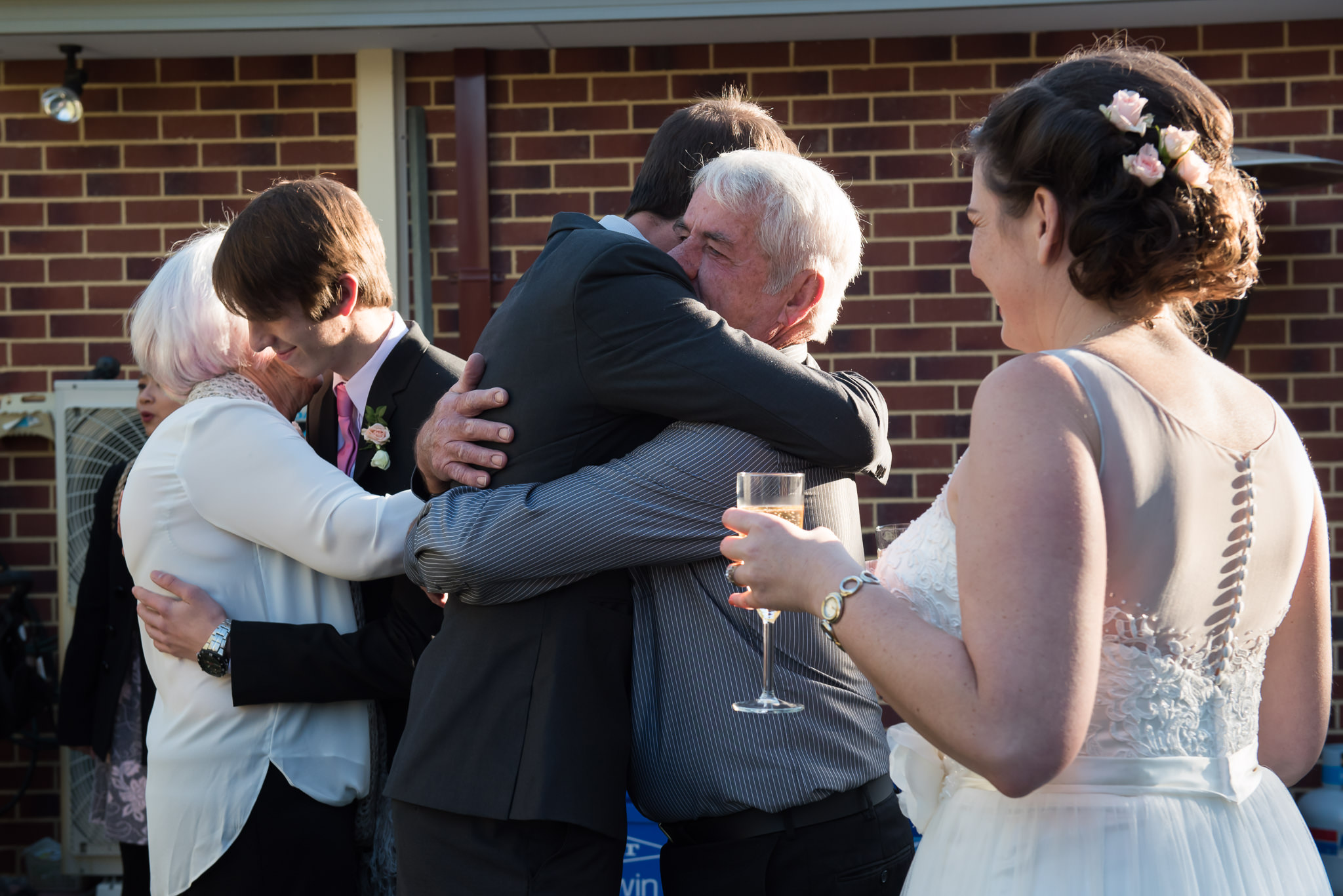 family congratulate groom