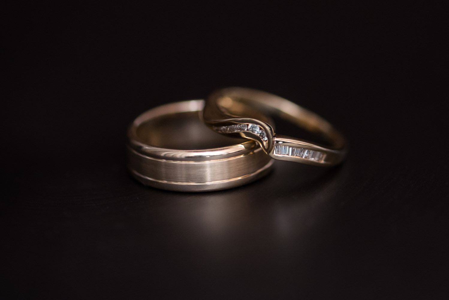 Close up of bride and groom rings