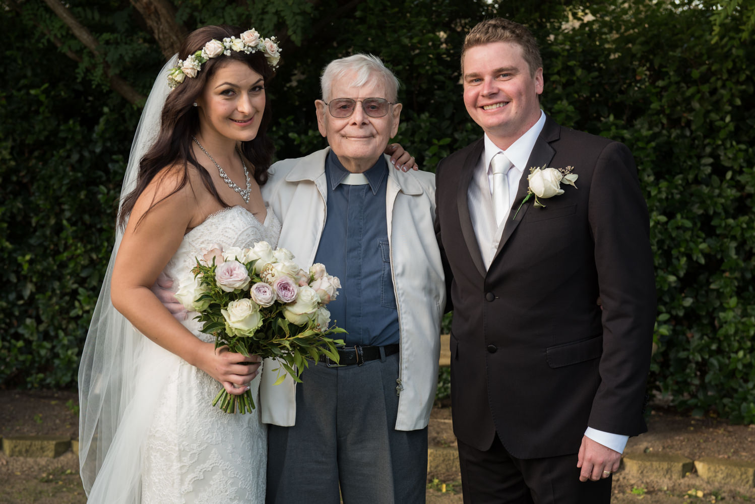 Bridge and groom with pastor celebrant