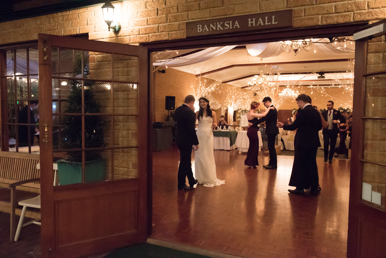 Bride and groom dancing in Banksia hall, Bridgeleigh reception centre