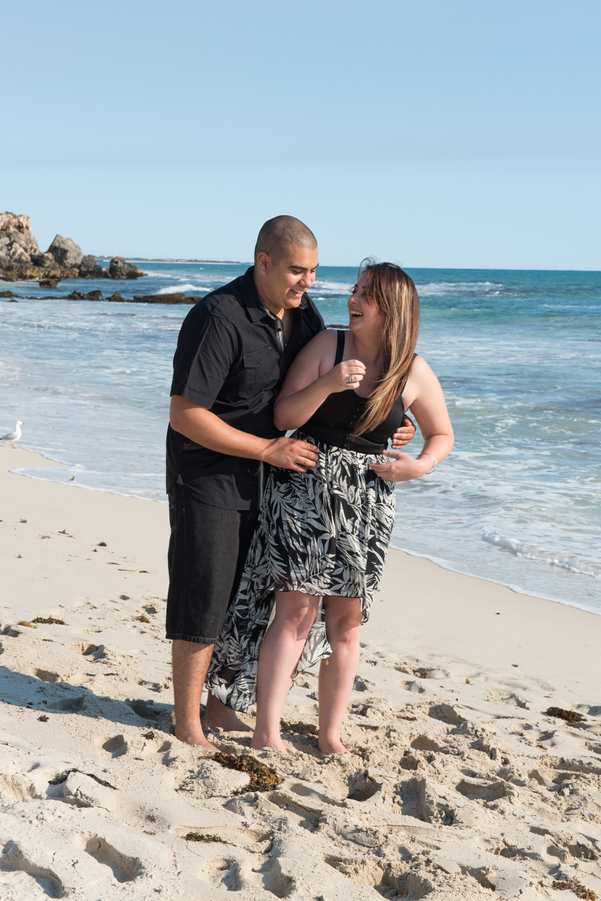 couple having fun on the beach