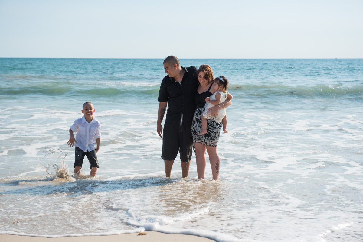 fun family photo at the beach