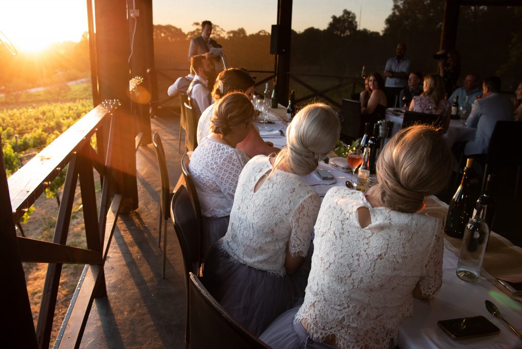 Golden sunset light during wedding reception at Fairbrossen winery