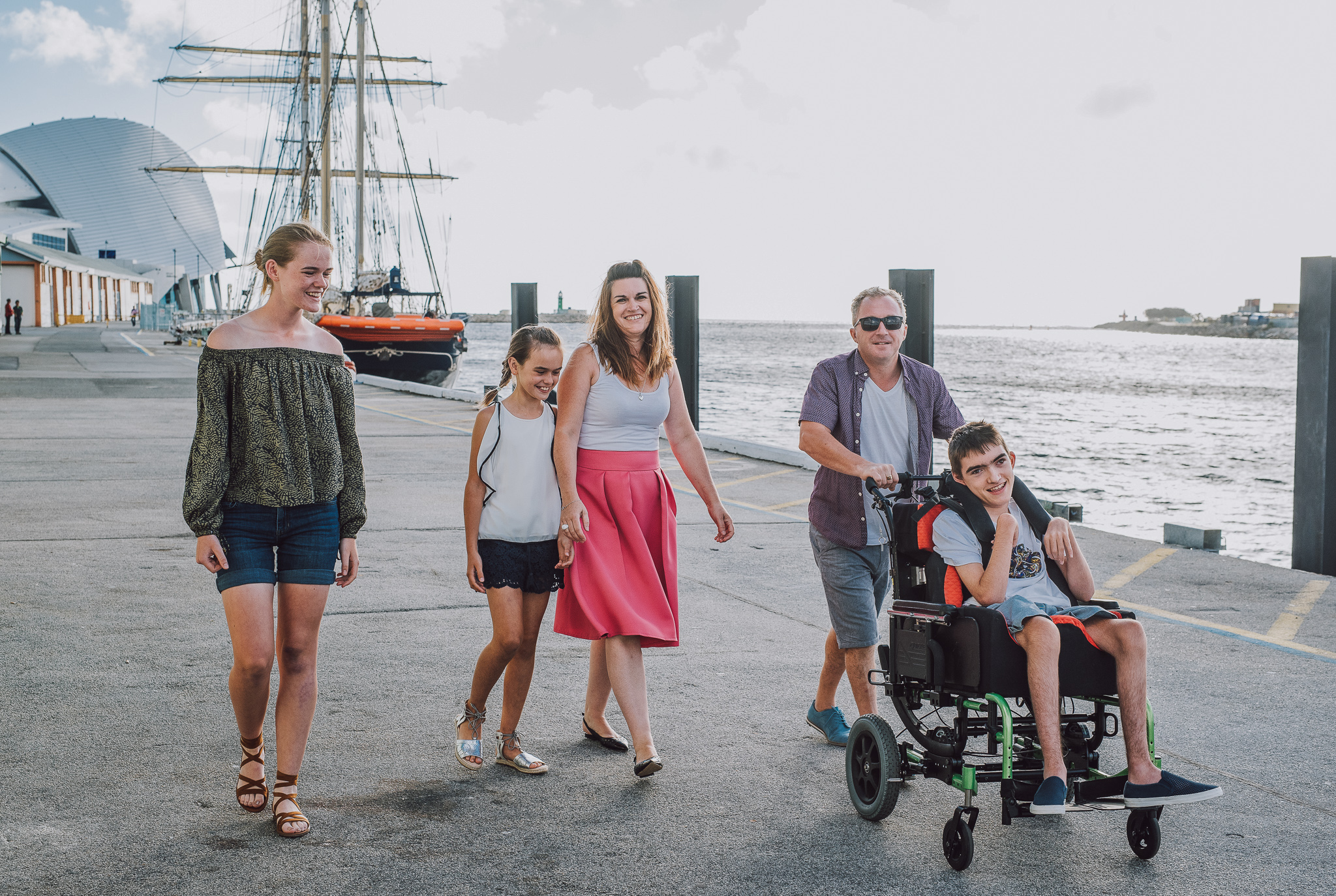 family walking along Fremantle wharf