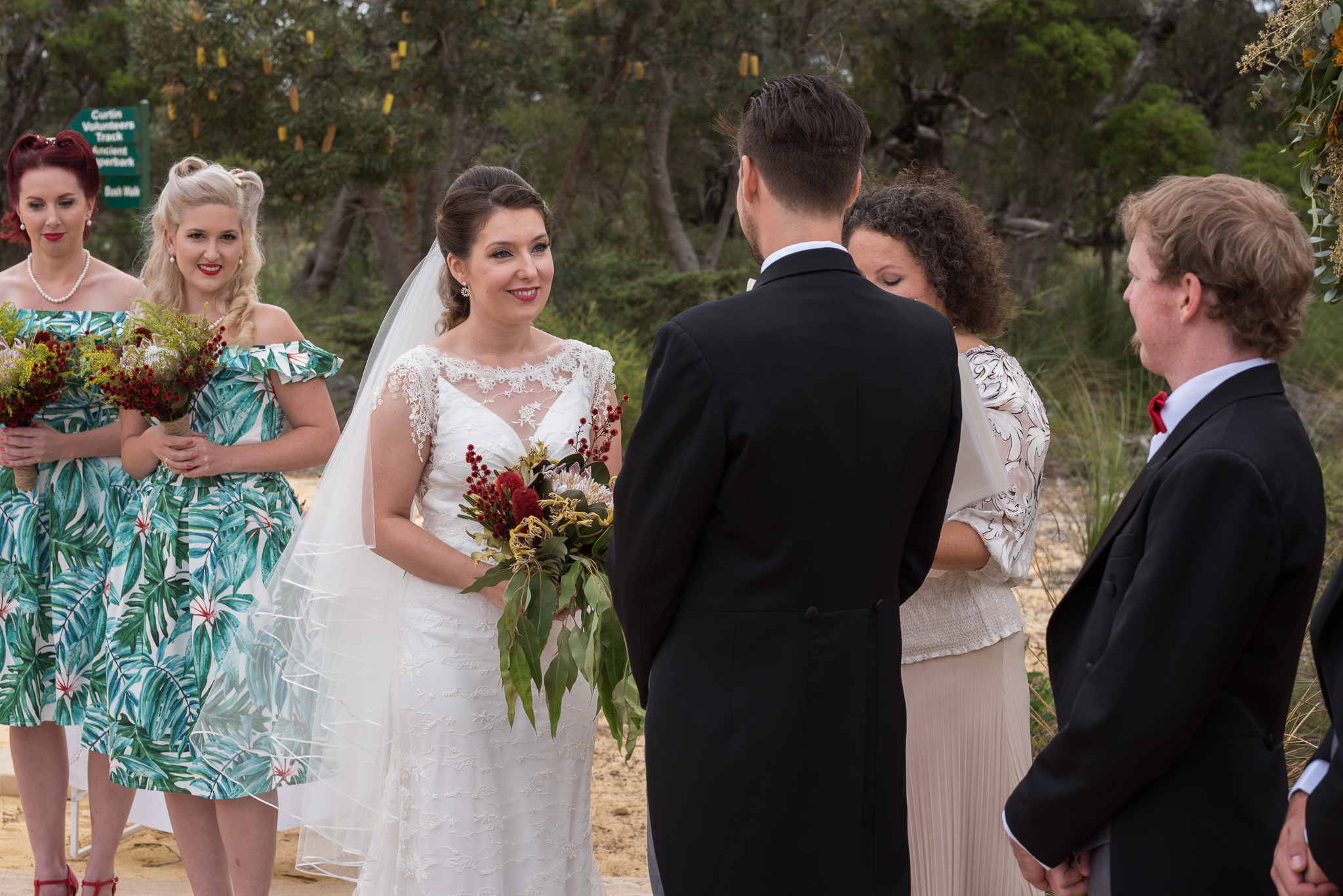 Bride looks at groom during wedding