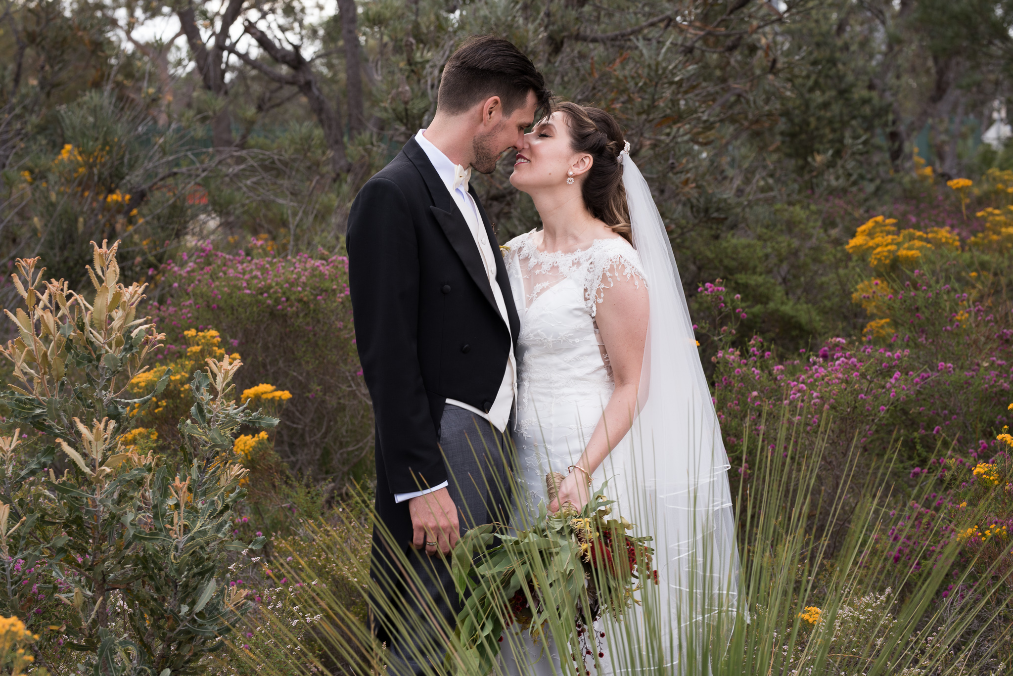 Relaxed wedding photography of bride and groom in the garden of GDC