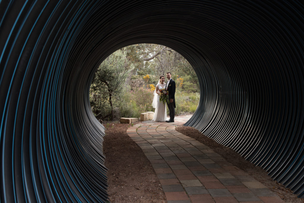 Bride and groom portrait using tunnel at the Gravity Discovery Centre