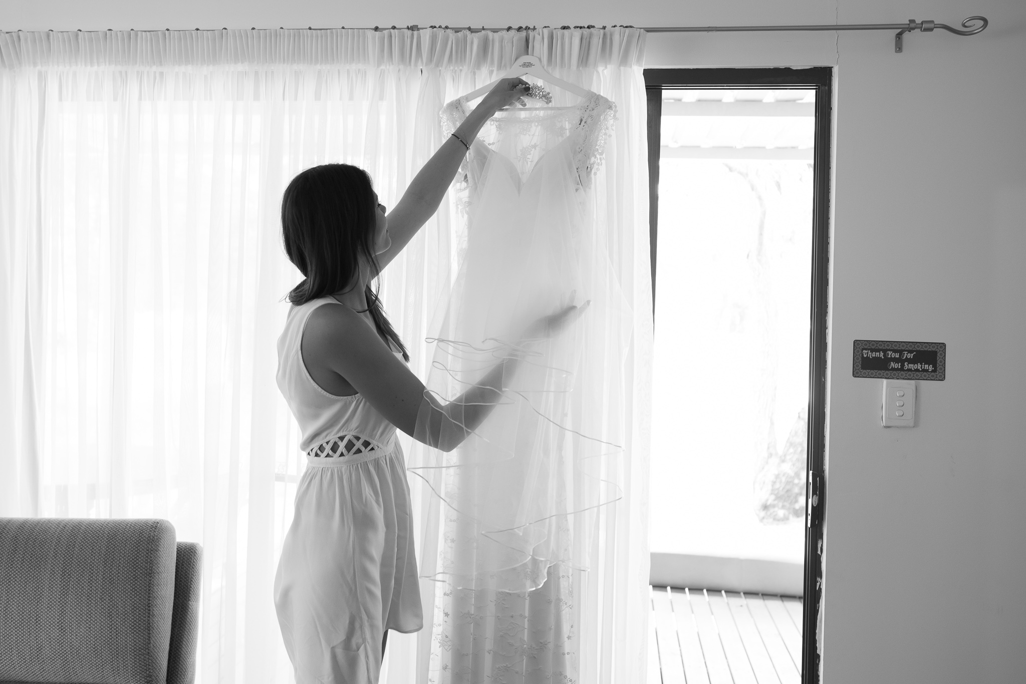 Bride's cousin place veil on the dress hanger at Serena Metta Retreat