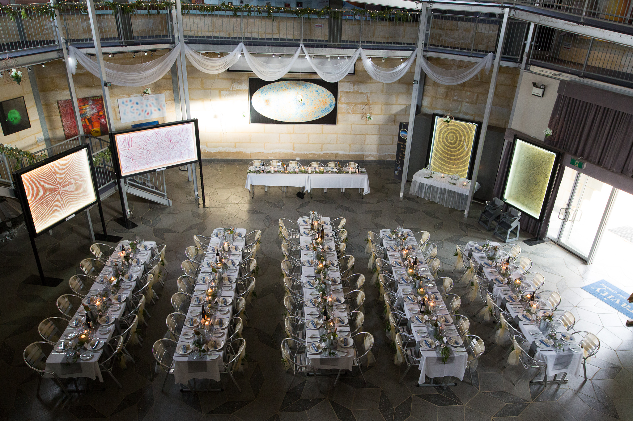 View over the reception setup of the GDC's first wedding in their Cosmology Gallery