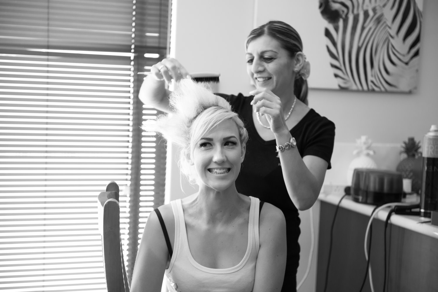 Bridesmaid having her hair done