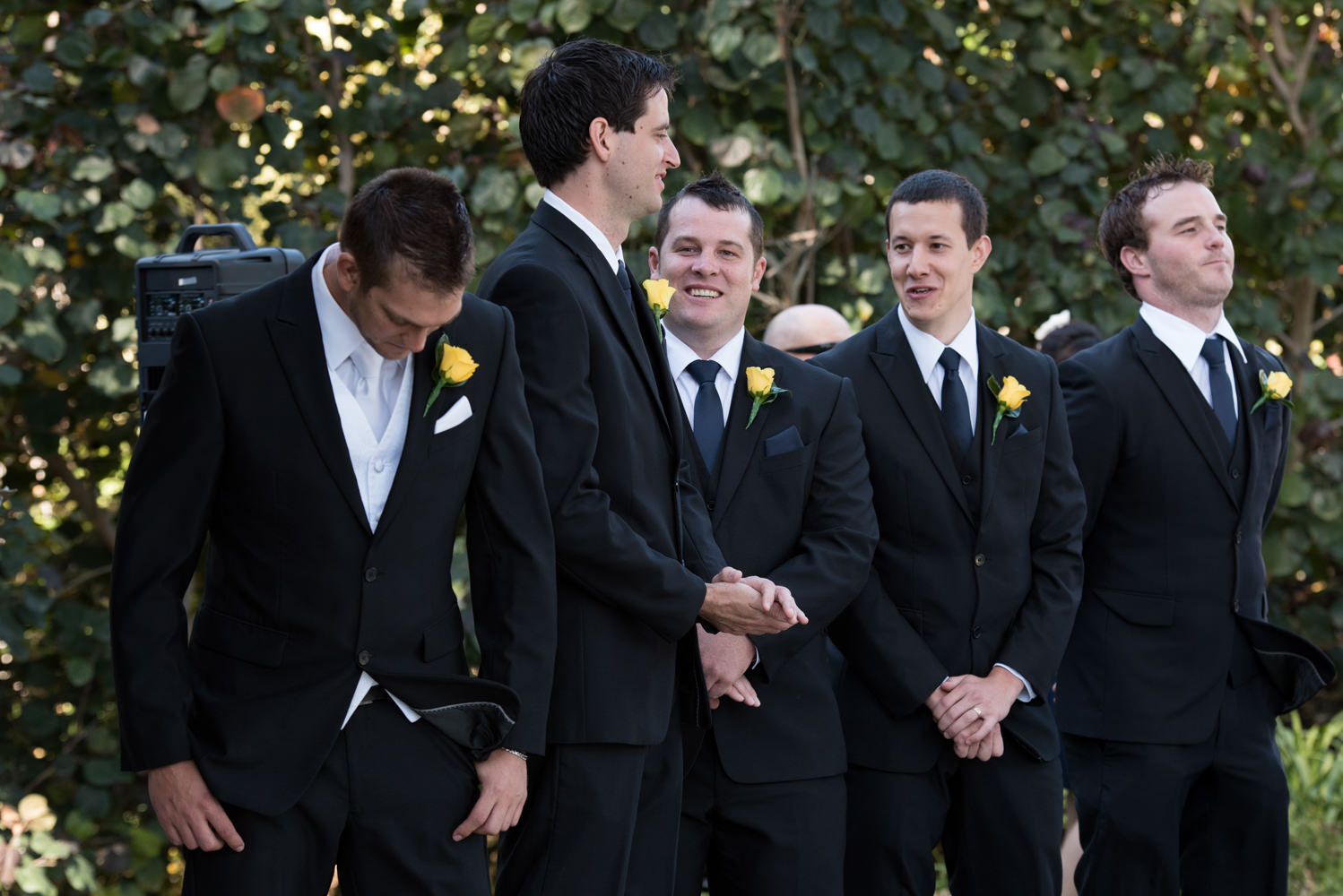 Groom and groomsmen waiting for the wedding to start