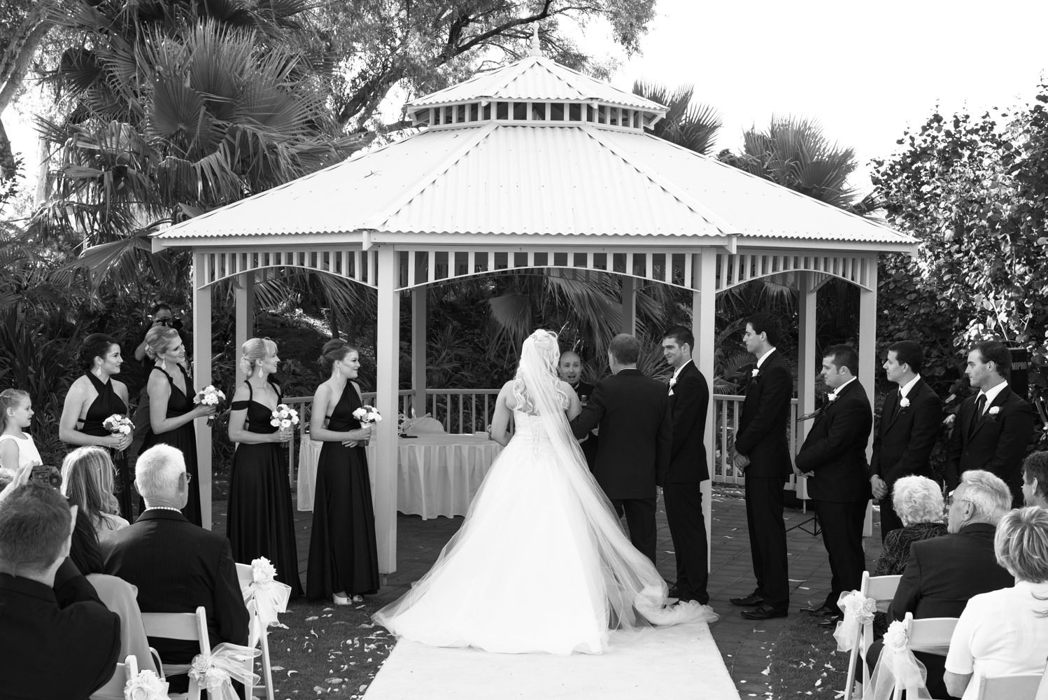 Bride's father gives the bride away