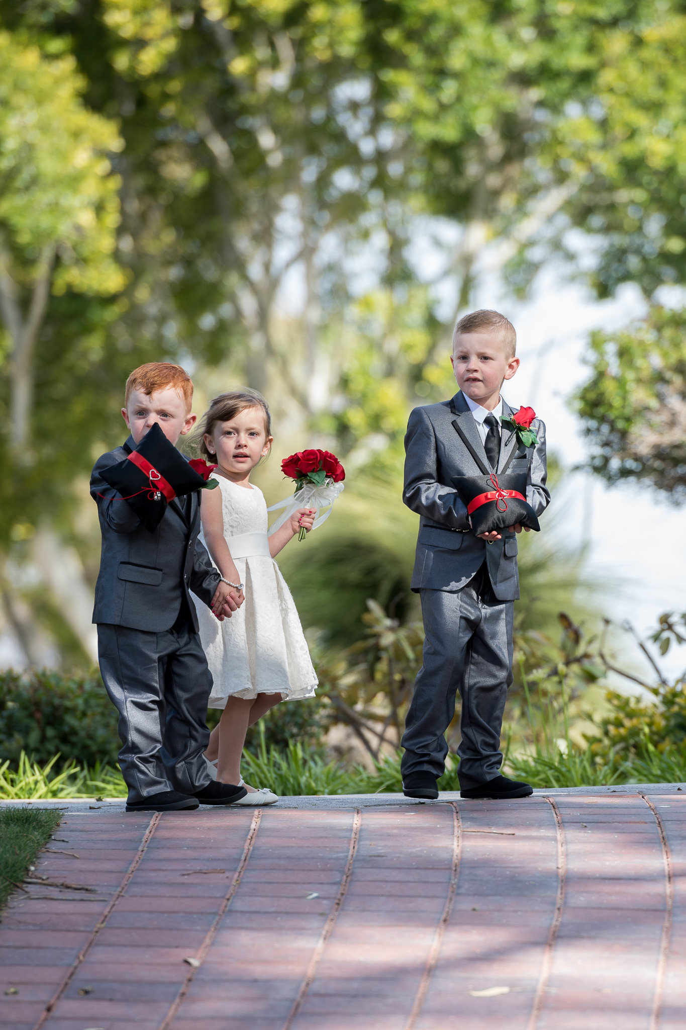 ring bearers look where to go down the aisle