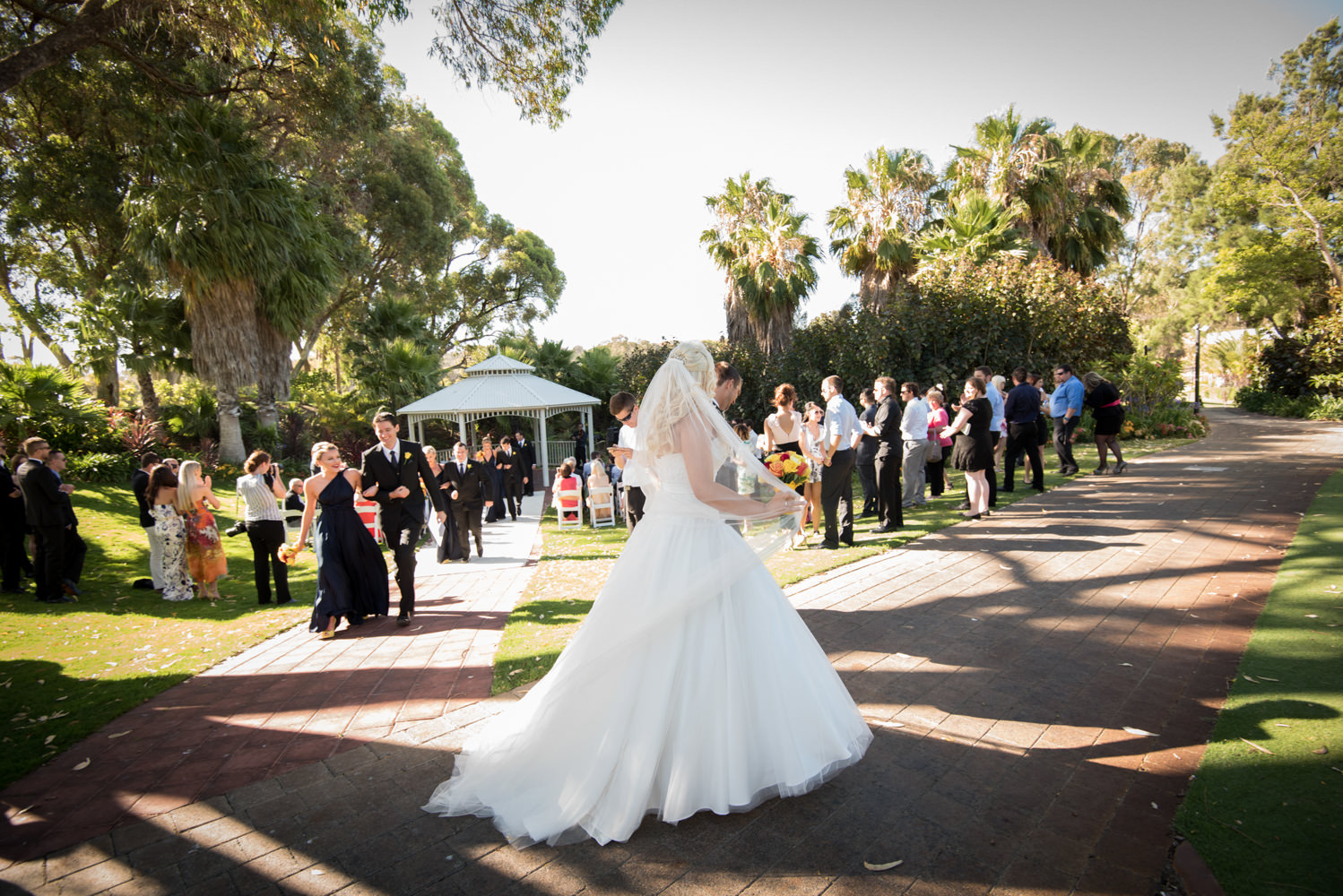 Bride and groom walk out of ceremony