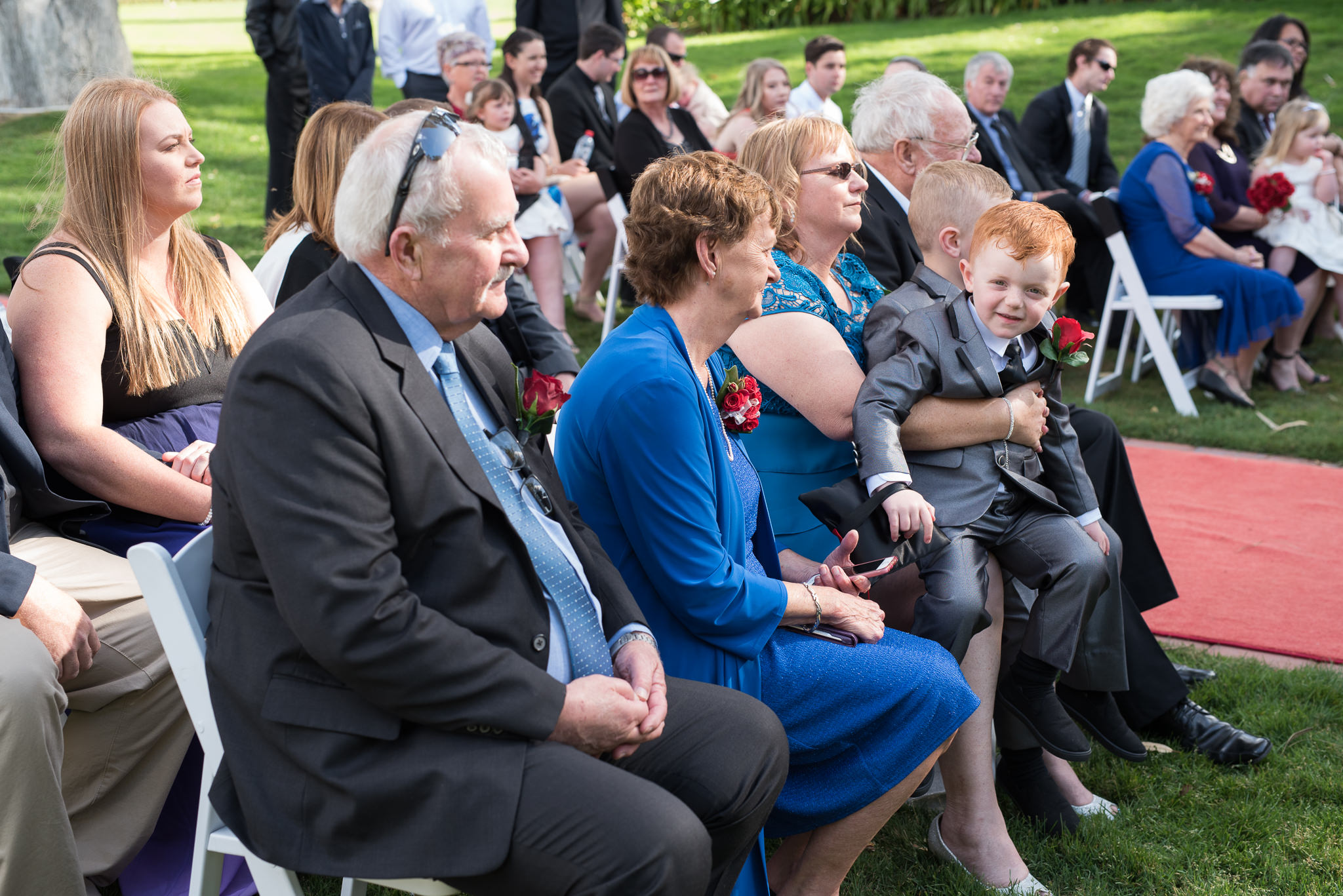 wedding guests watching wedding ceremony