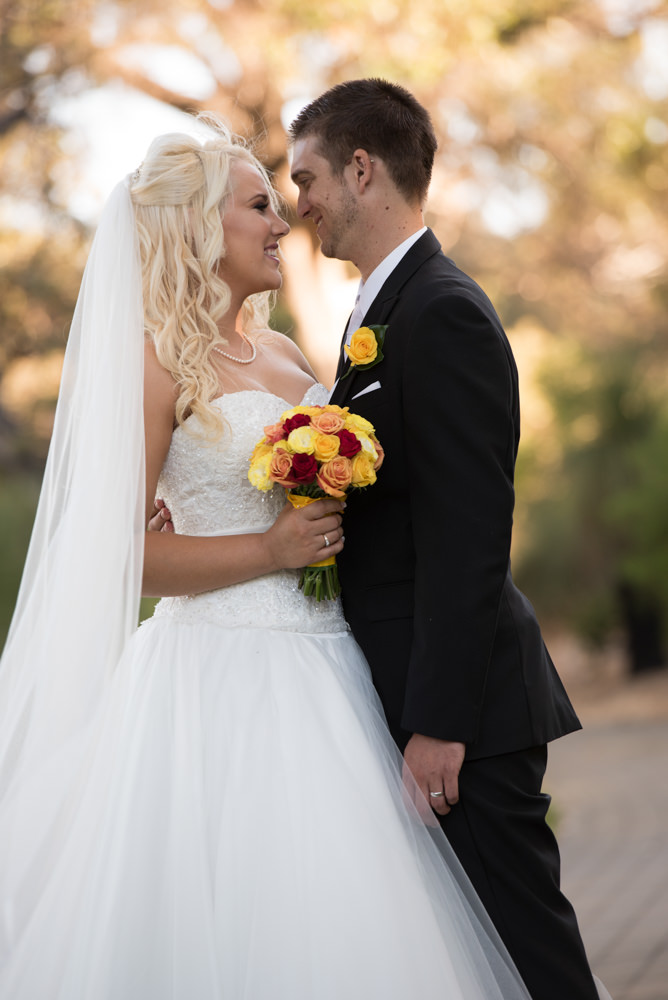 Bride and groom looking at each other