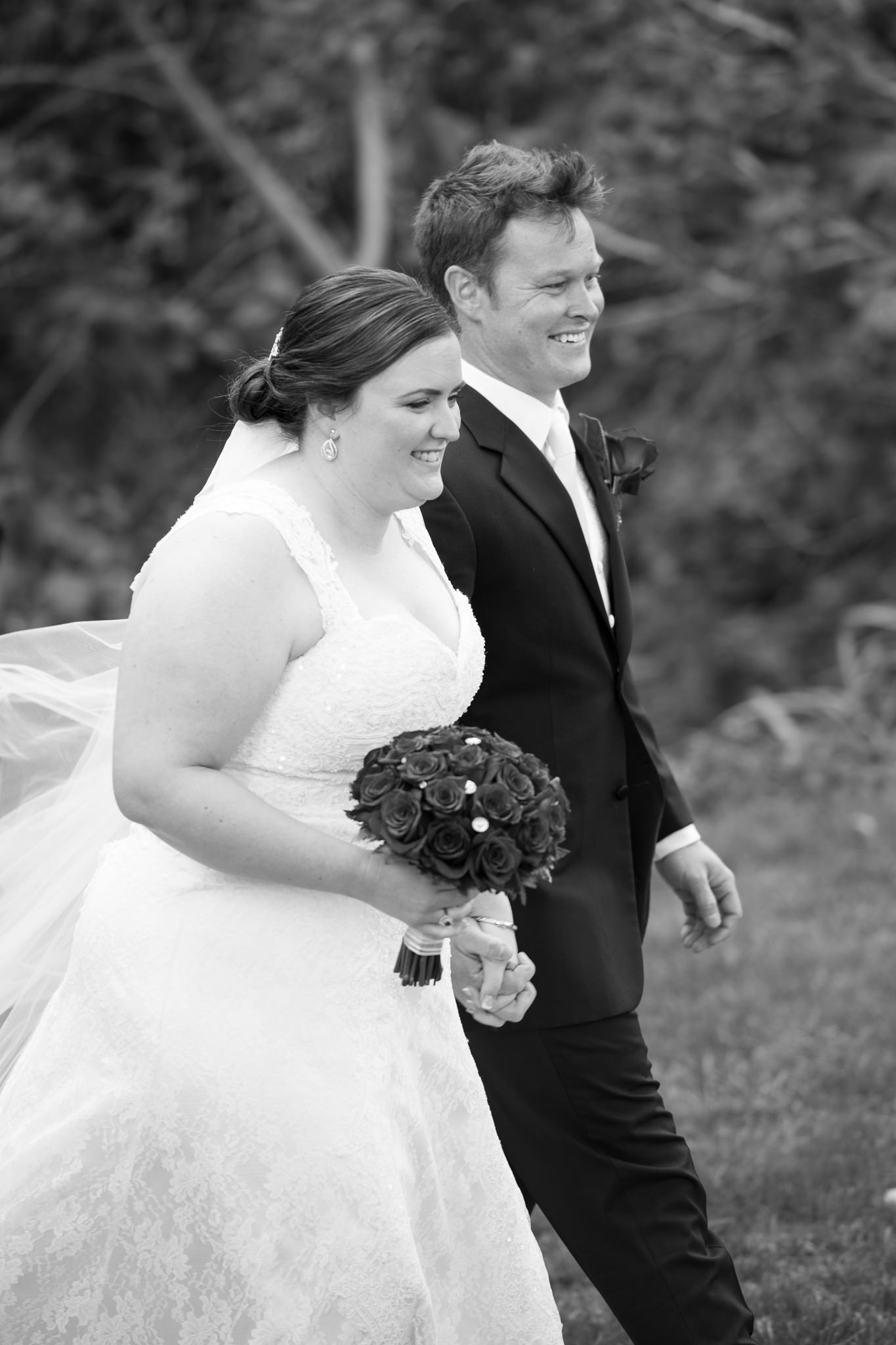 bride and groom newly married in black and white