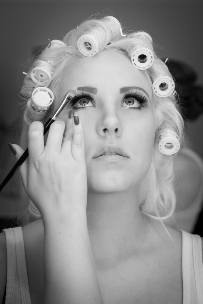 Bride having her eye makeup done