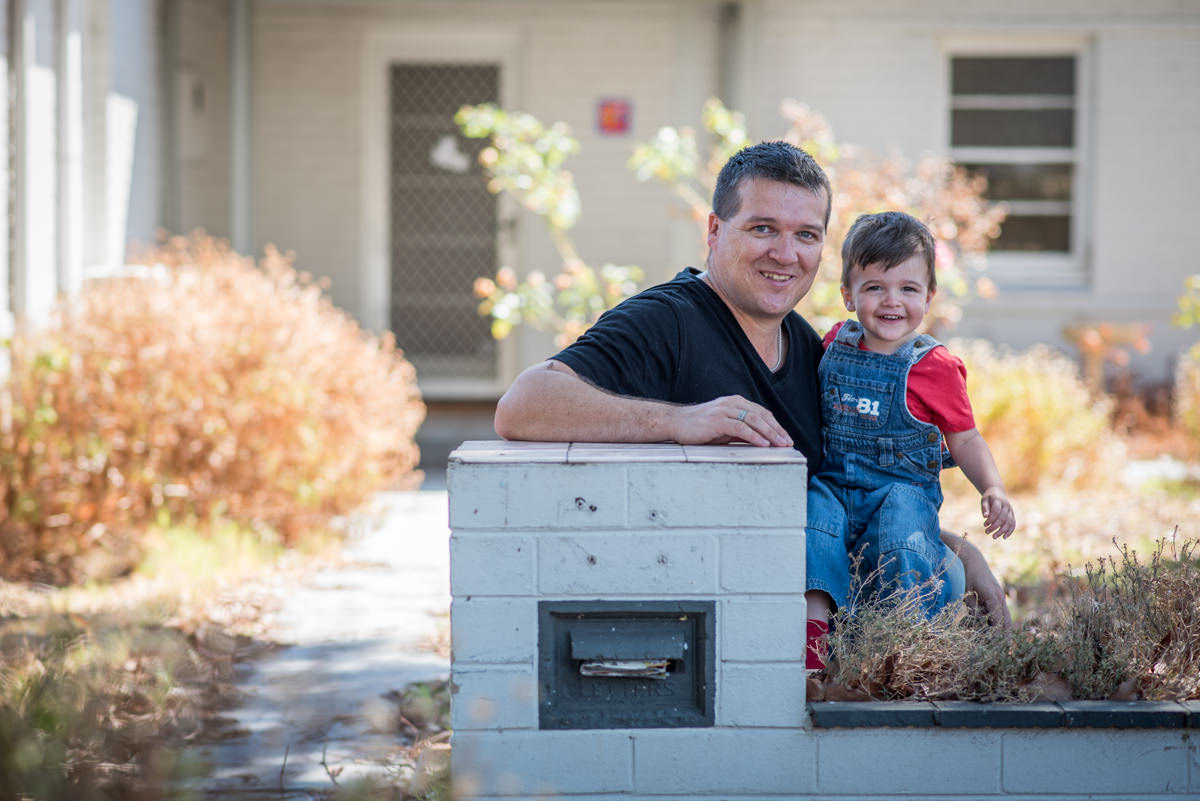 Father and son photograph outside old family Perth home