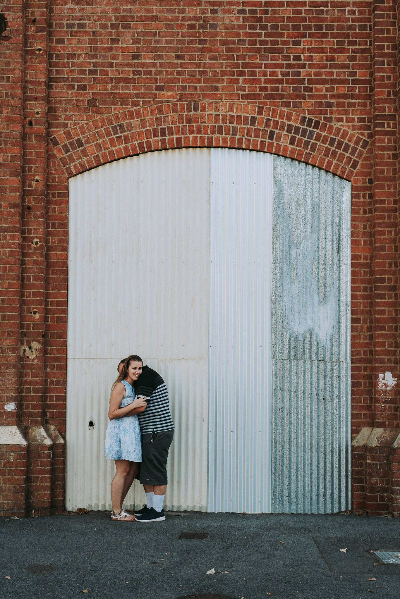 Midland railways workshops portrait of girl and boy in front of corrugated iron doorway