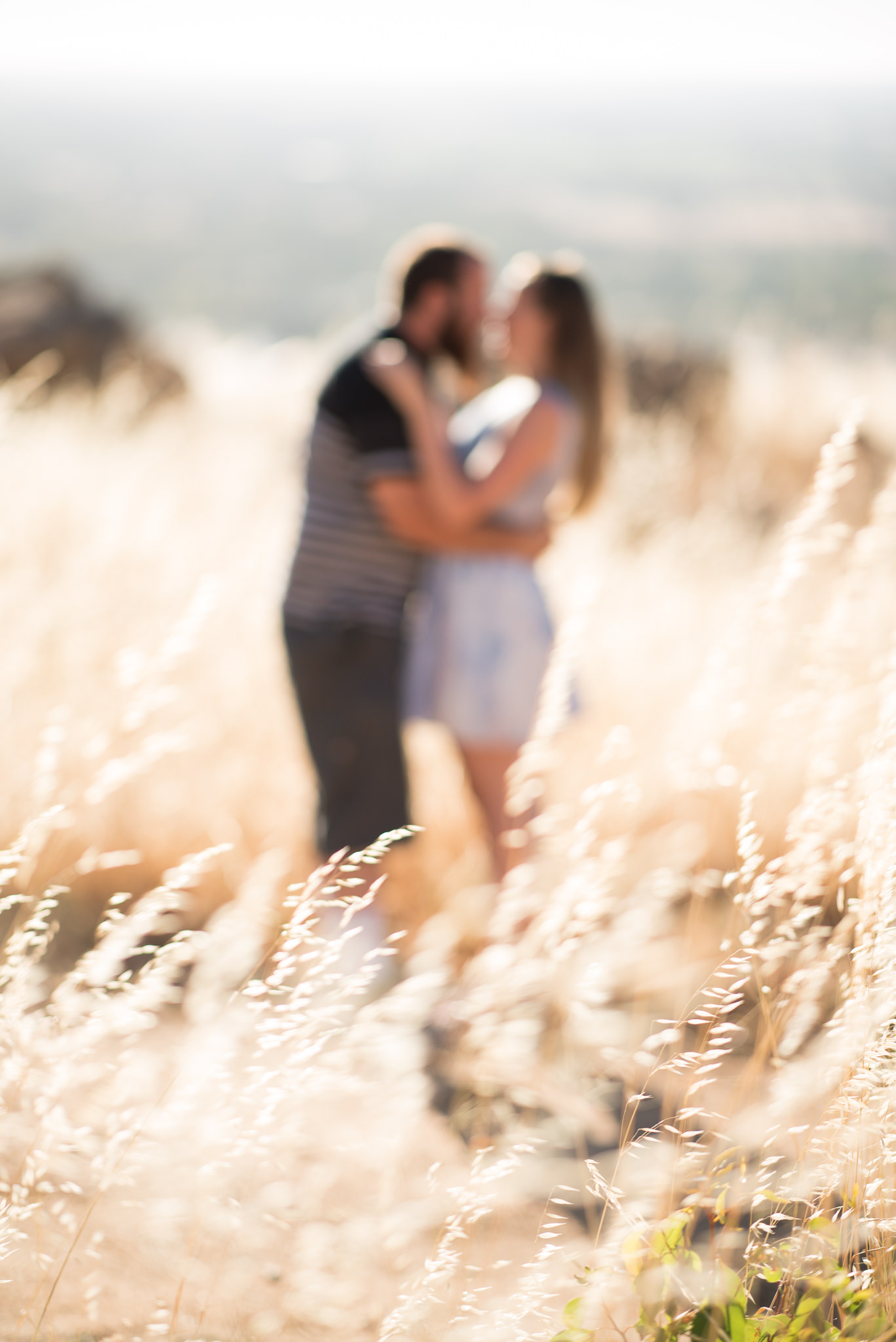 Artistic blurred engaged couple