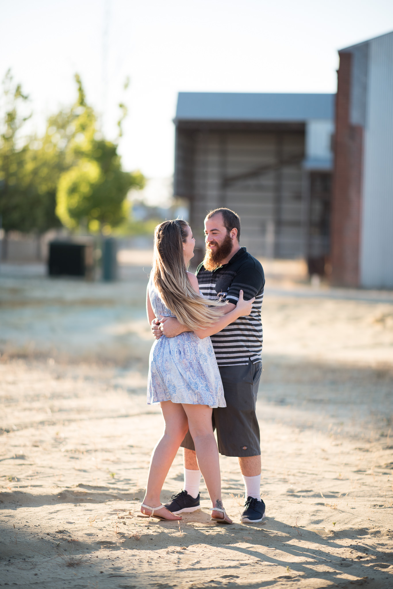 girl and guy spinning around