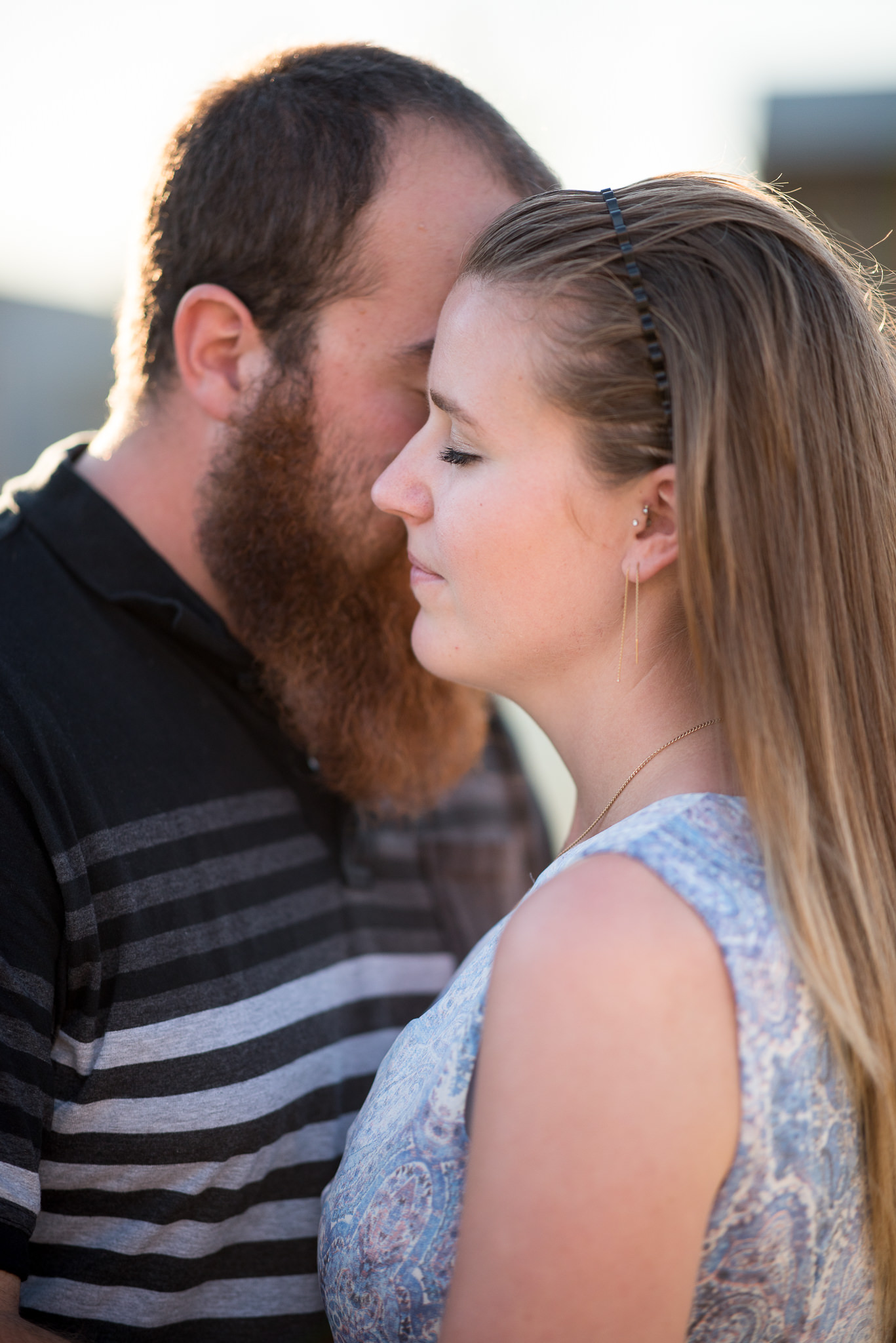 closeup of guy and girl with eyes closed