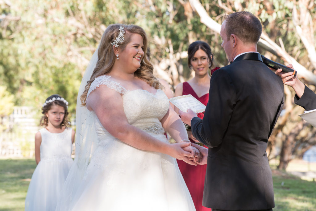 groom reads his vows to bride at Mulberry Estate