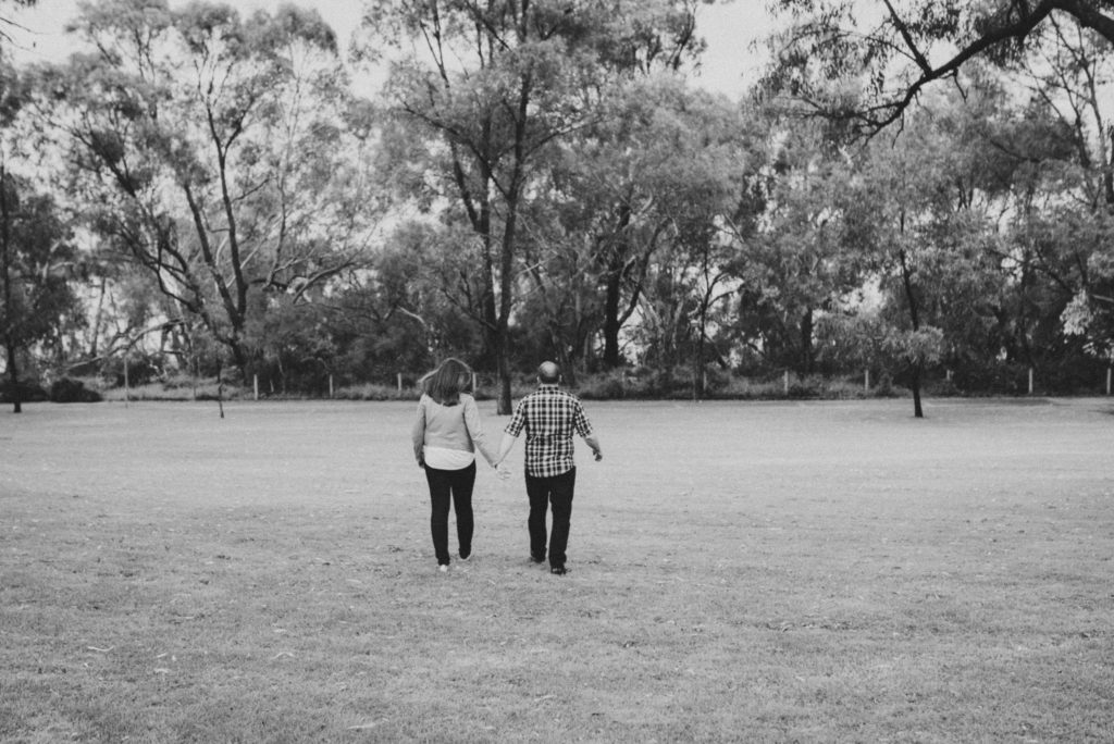 couple walking away from the camera