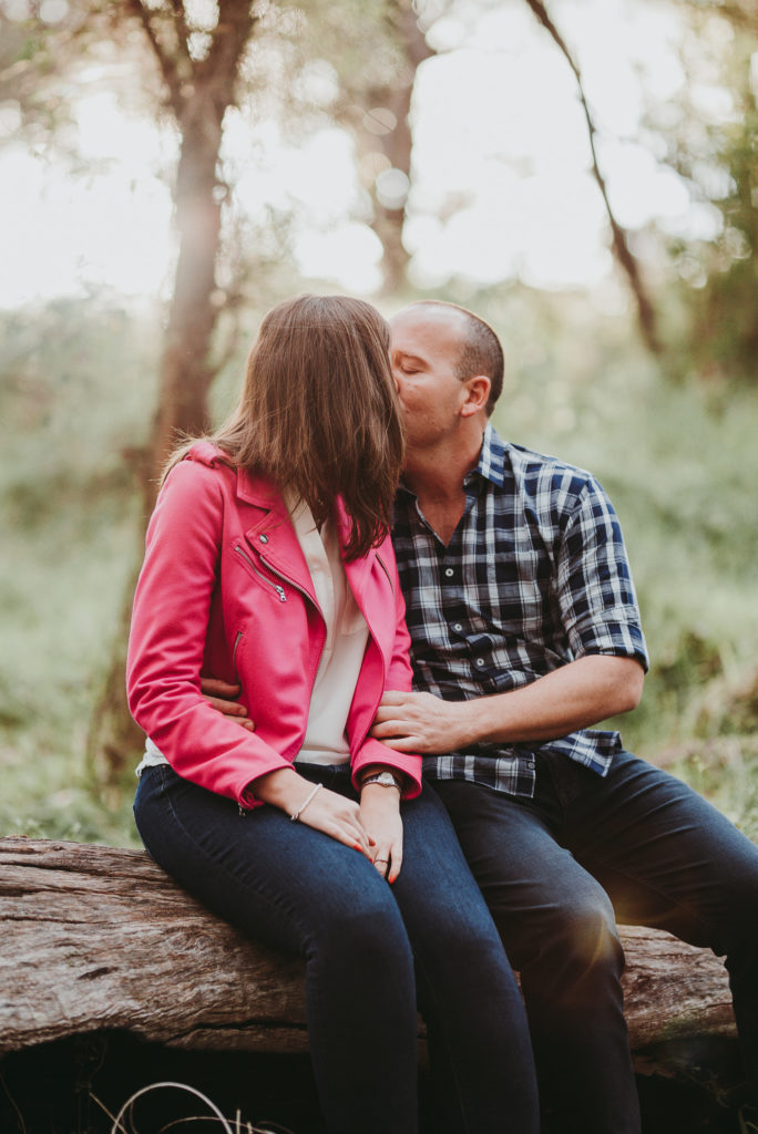 kissing on a log