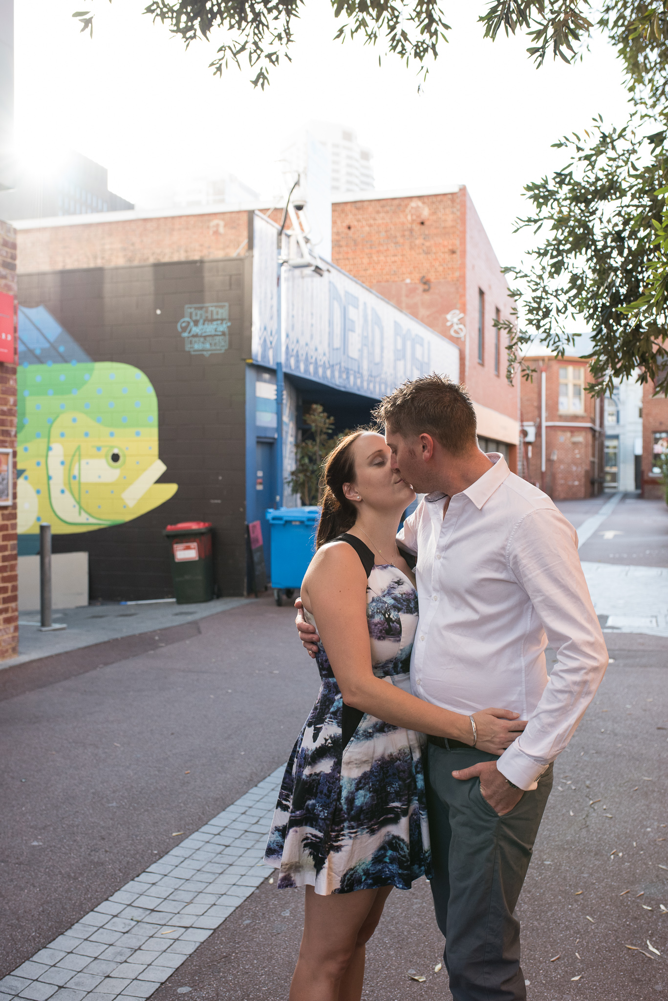 Engaged couple kissing on their Wolf Lane e-shoot