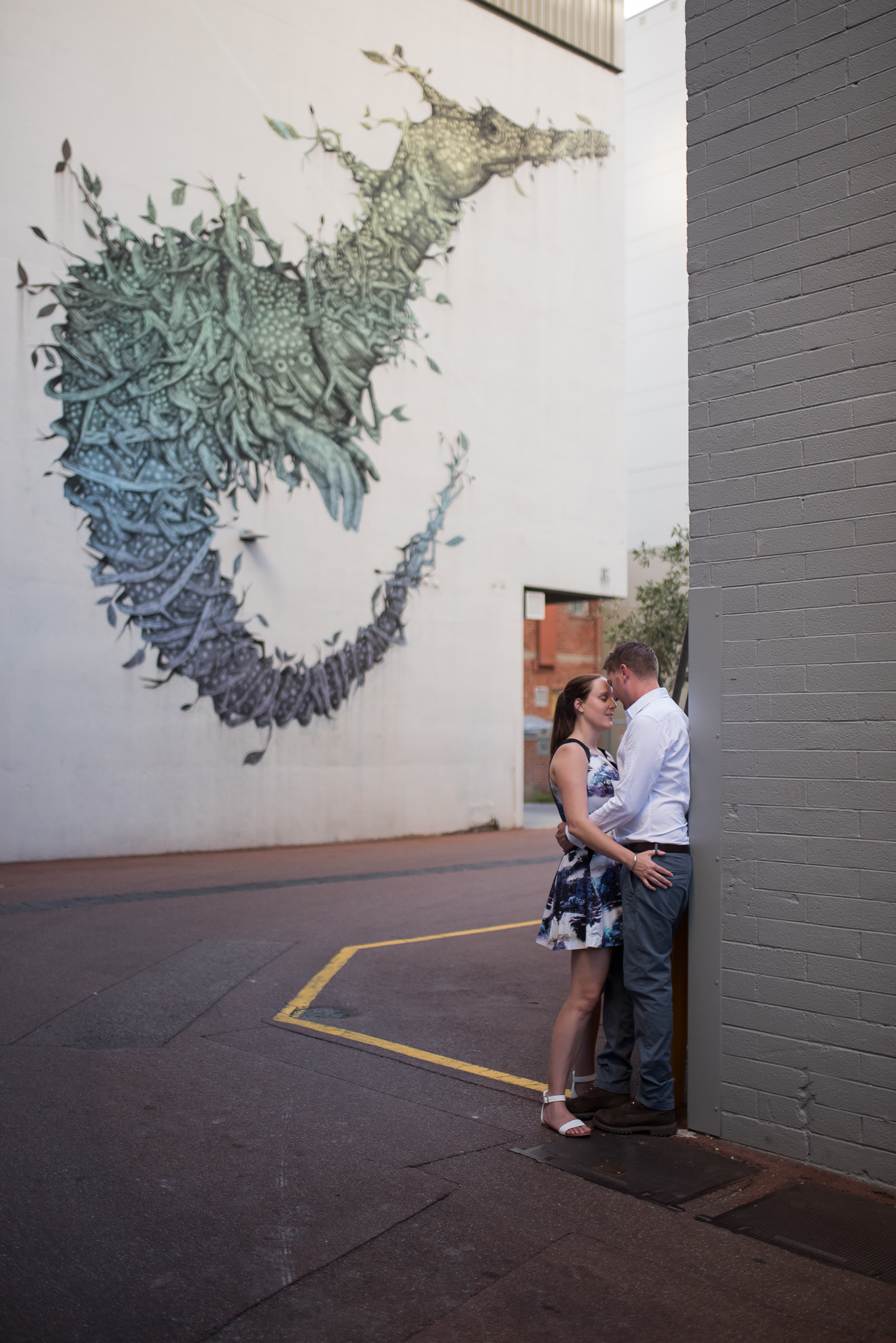 Girl looking at her fiancee on their Wolf Lane engagement shoot