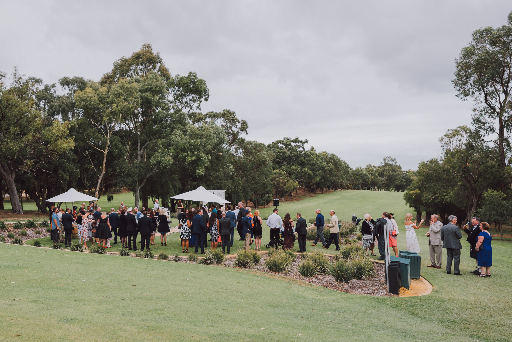 wide shot of wedding ceremony at Point Walter golf course