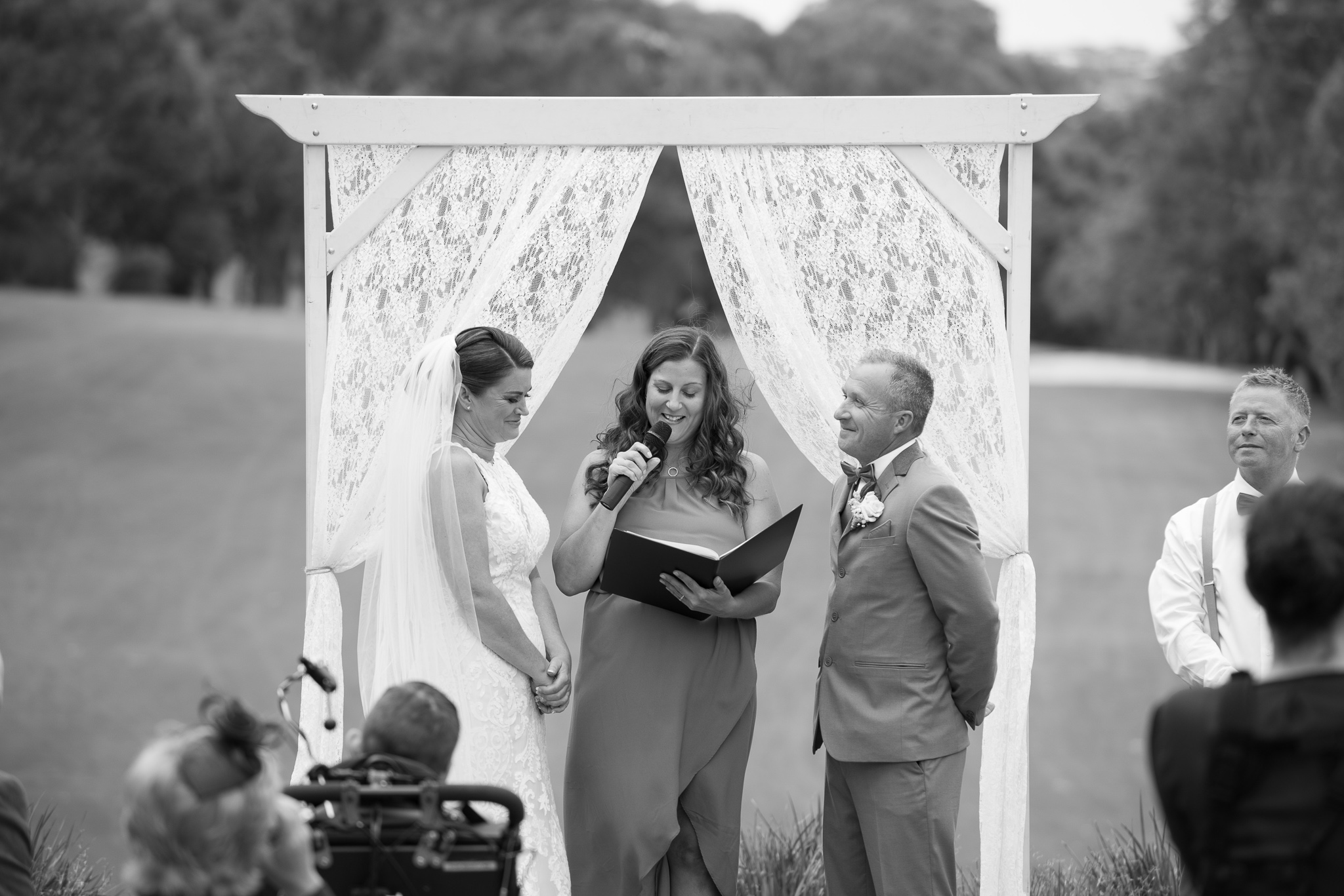 celebrant reads during ceremony