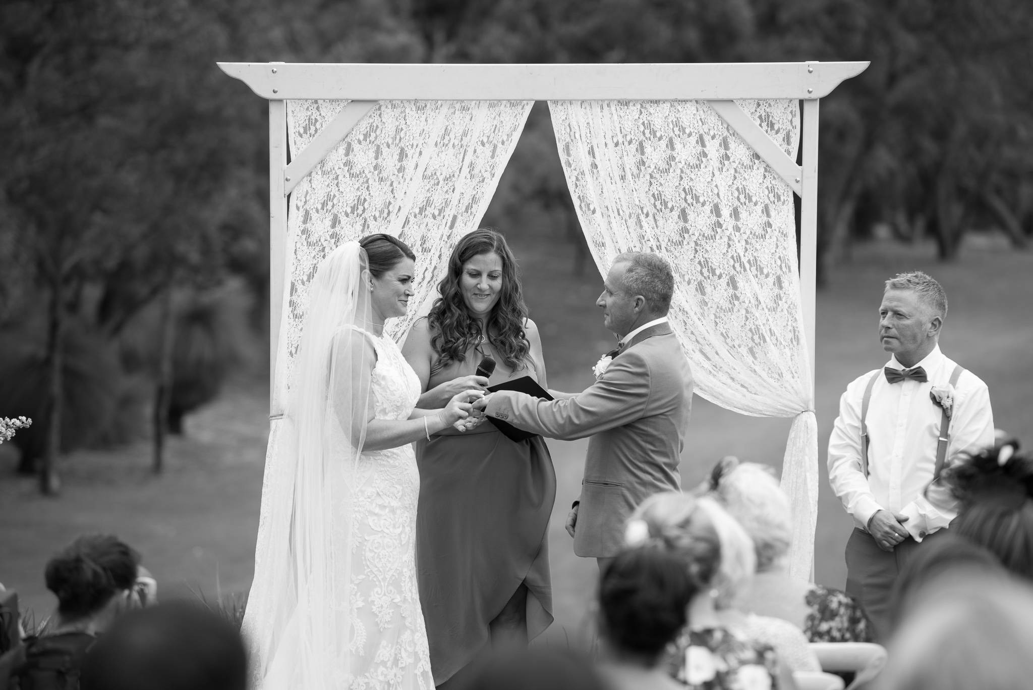 bride and groom exchange rings