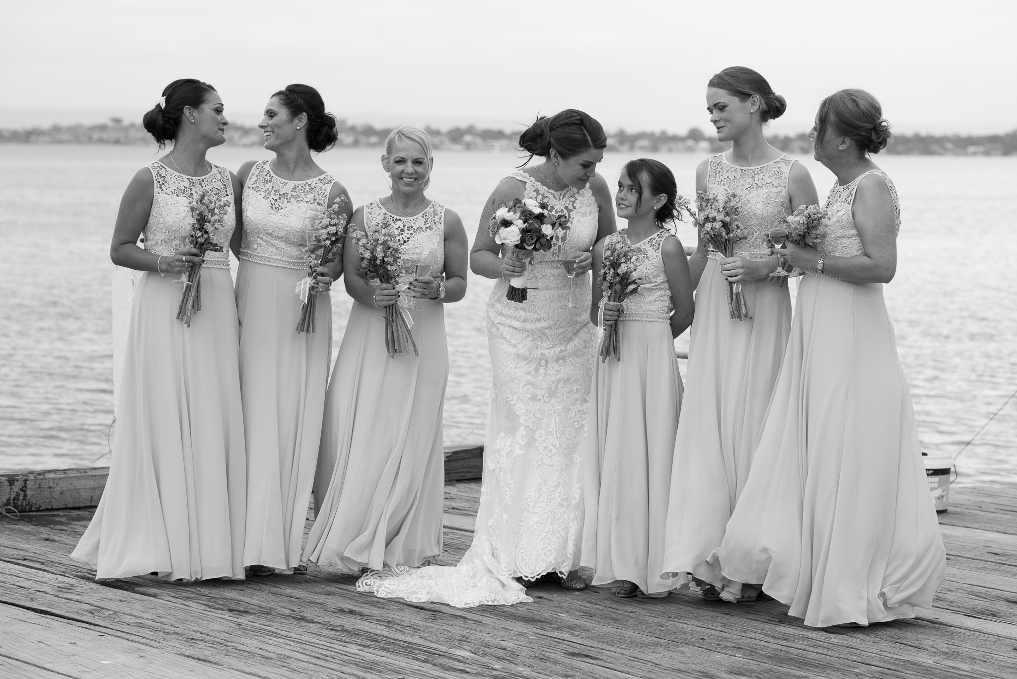 black and white group shot of bride and her bridesmaids