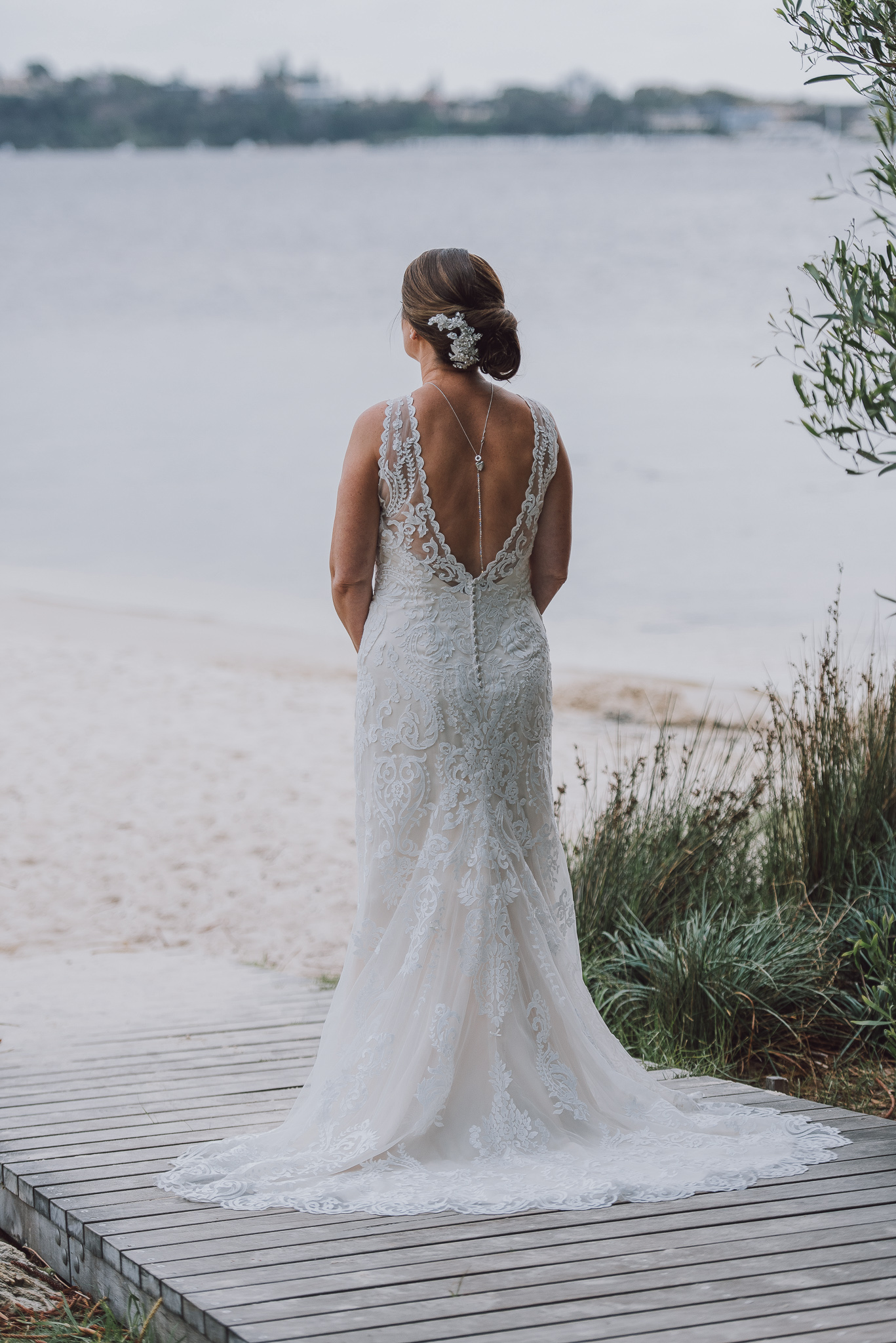 back of bride's dress at the beach