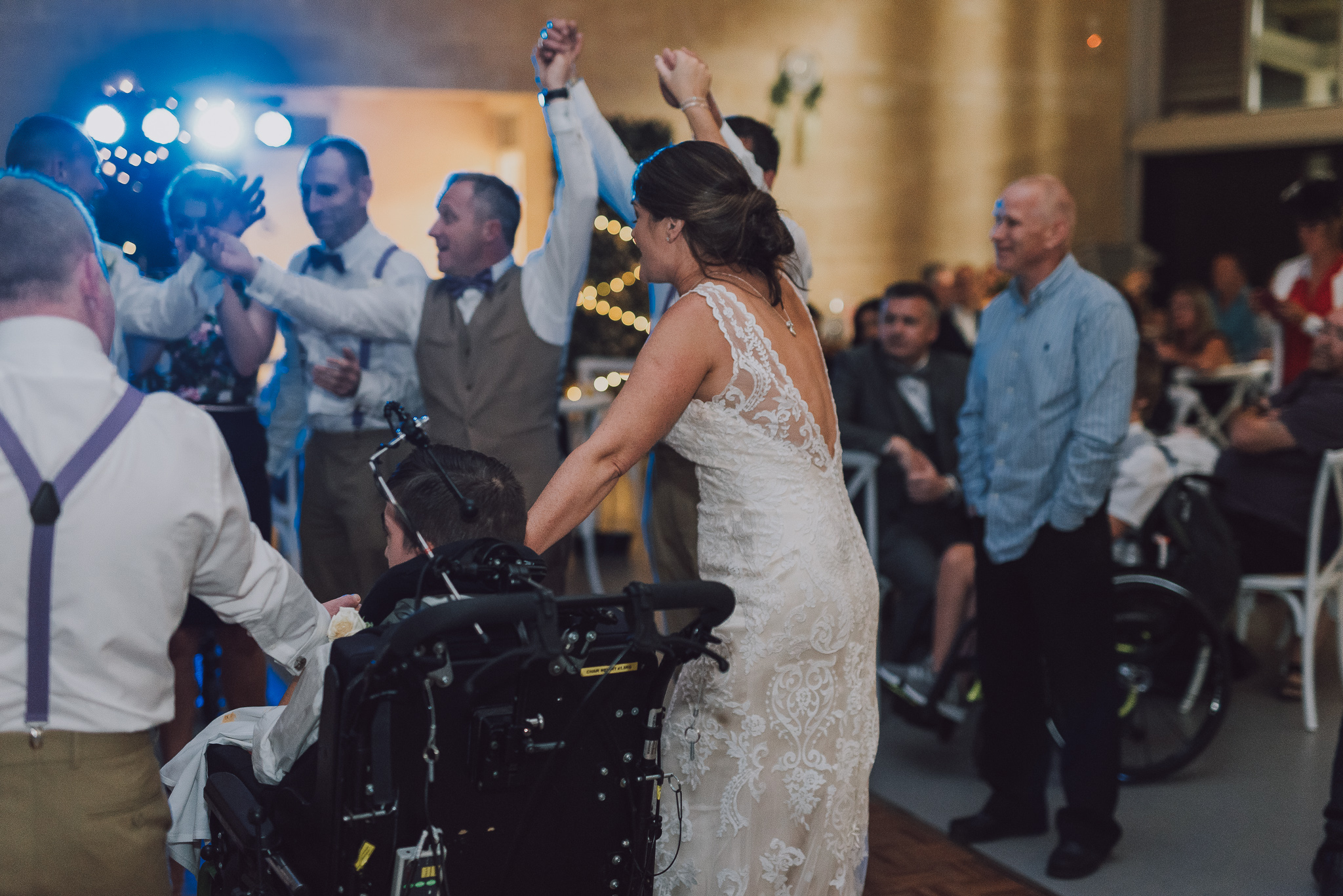 bride with her family on the dance floor